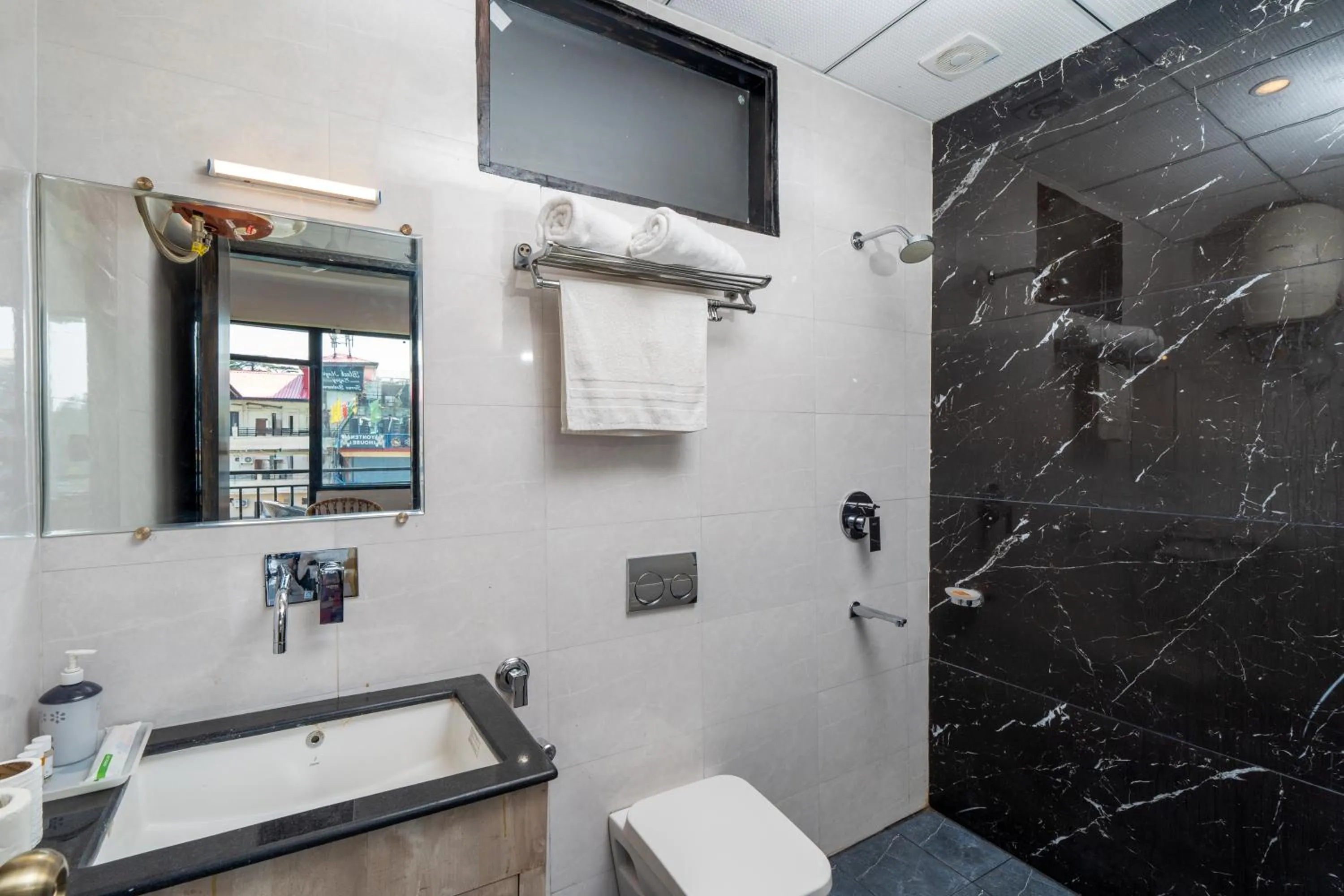 Shower in Hotel Buddha's Abode- Best Hotel in McleodGanj Main Market