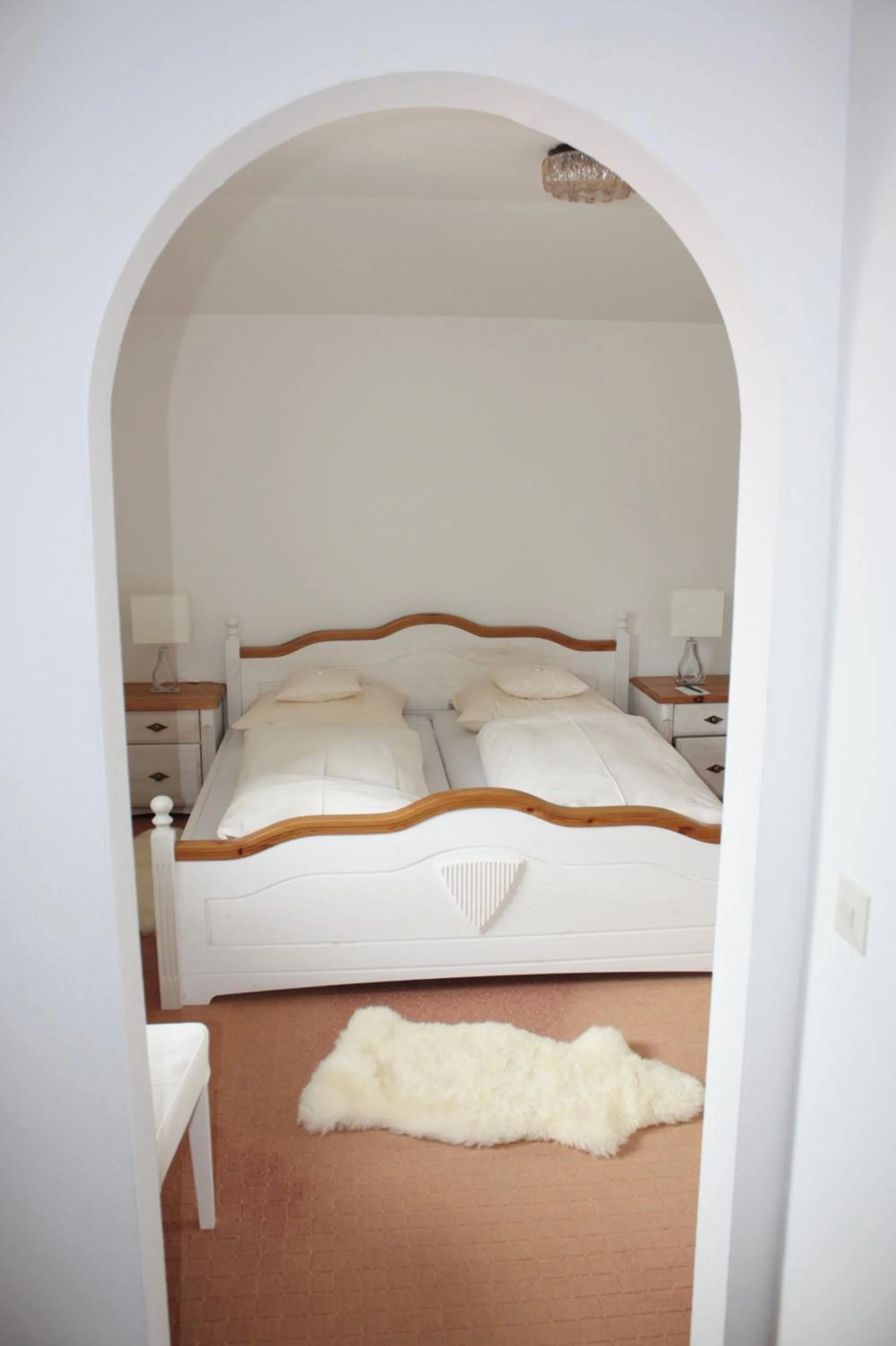 Photo of the whole room, Bed in Landhotel Maiergschwendt inkl Chiemgaukarte