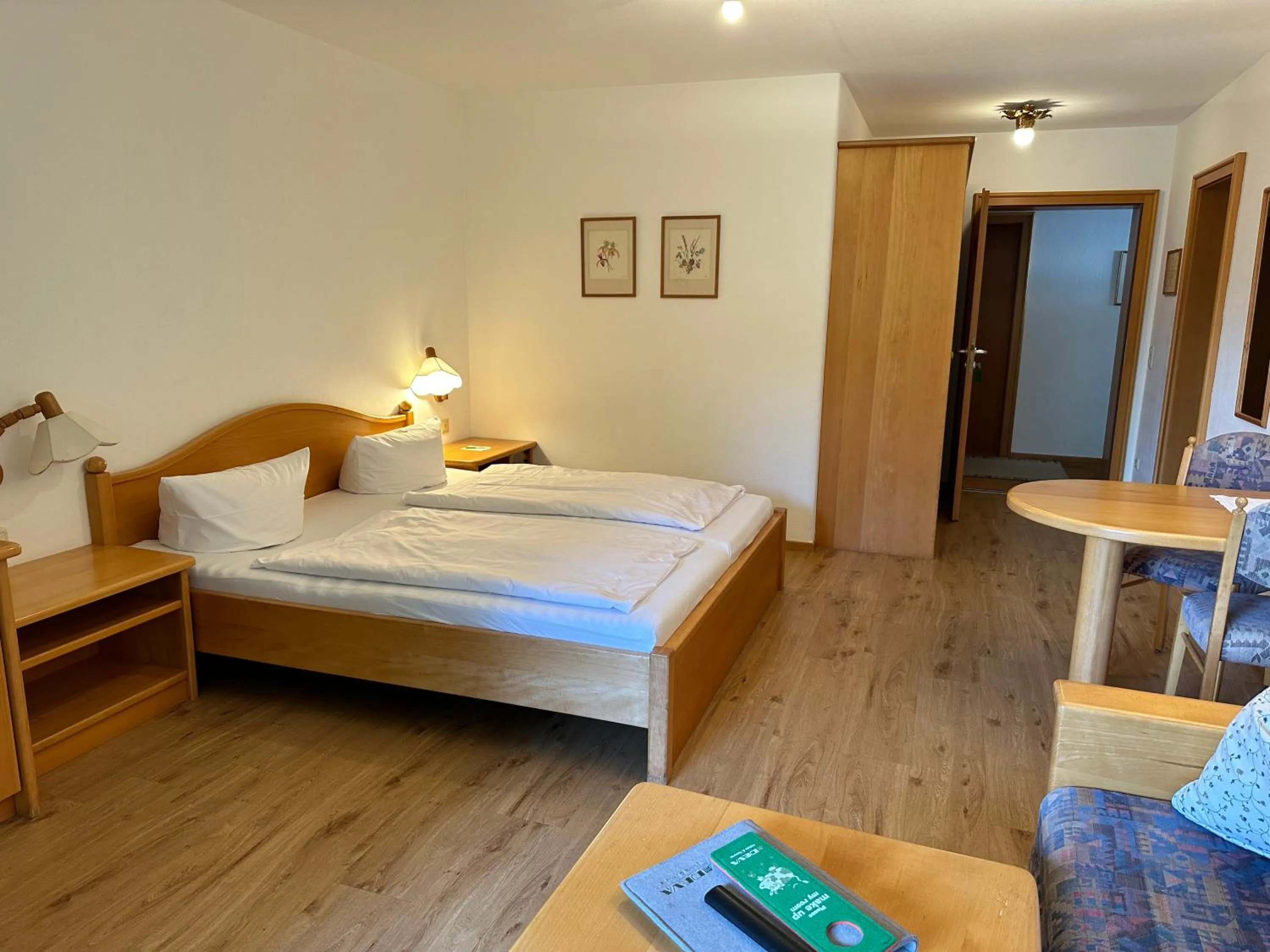 Photo of the whole room, Bed in Landhotel Maiergschwendt inkl Chiemgaukarte