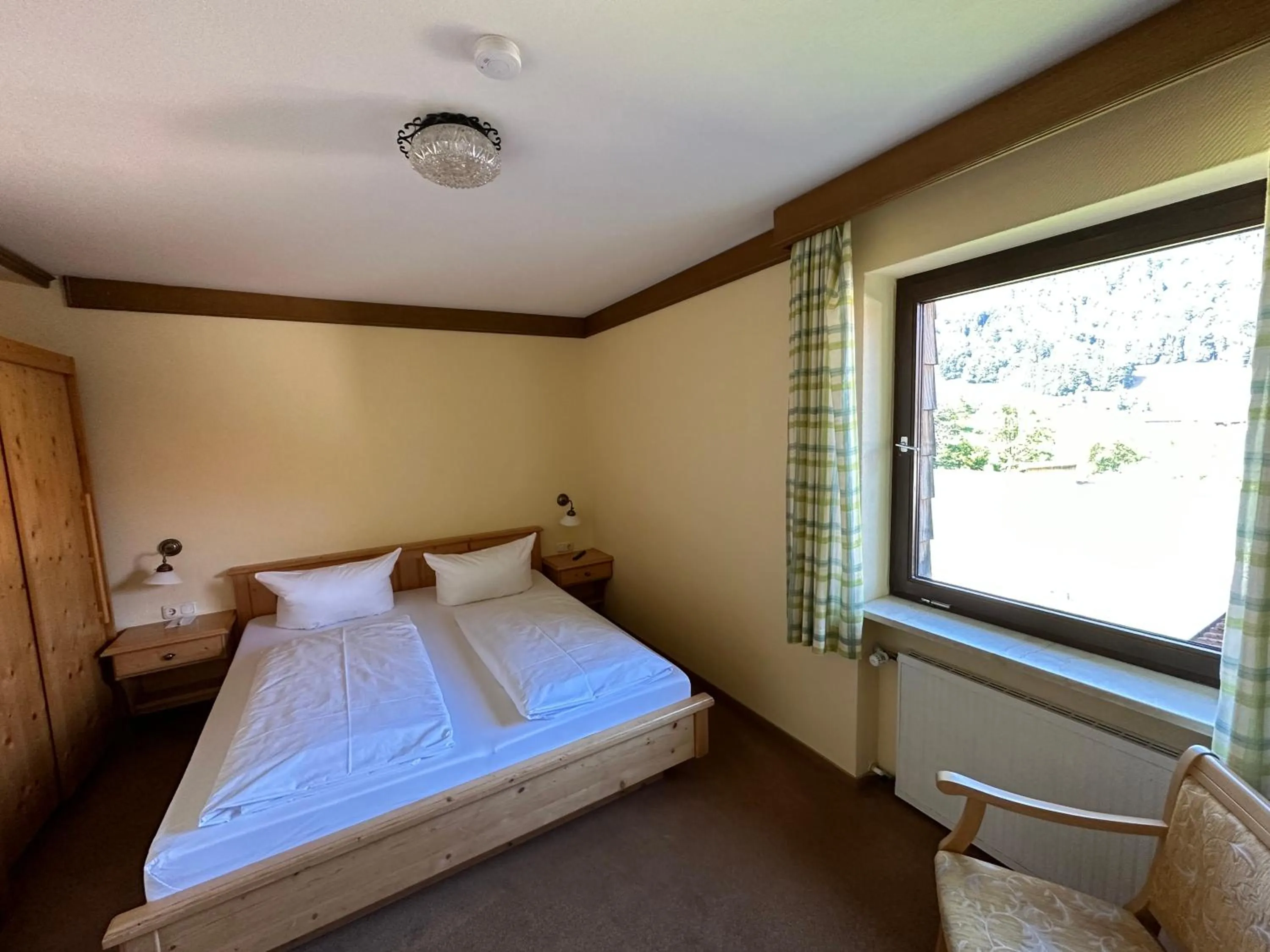 Photo of the whole room, Bed in Landhotel Maiergschwendt inkl Chiemgaukarte