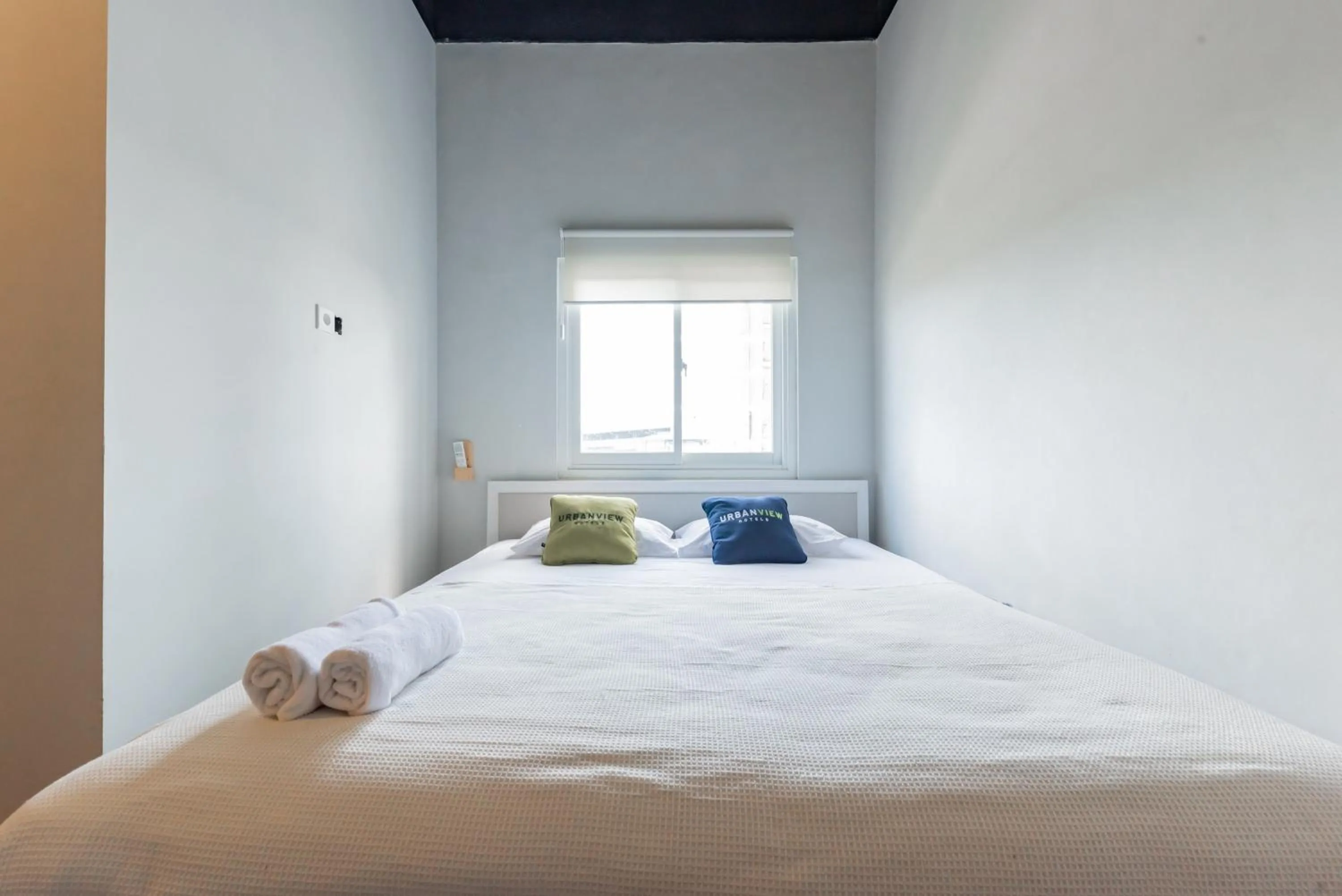 Bedroom, Bed in Urbanview Hotel The Tang Balikpapan by RedDoorz