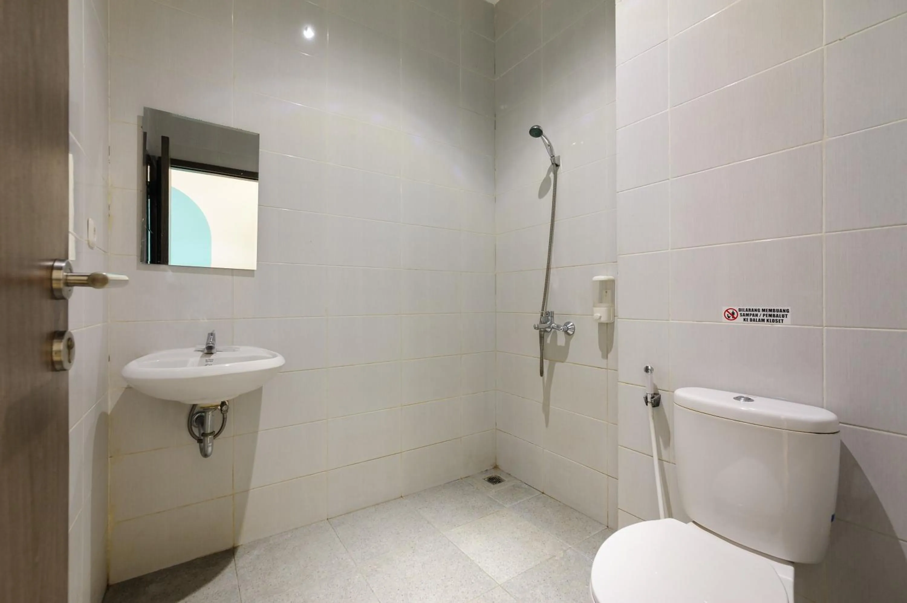 Bathroom in Sans Hotel Max Living Cengkareng