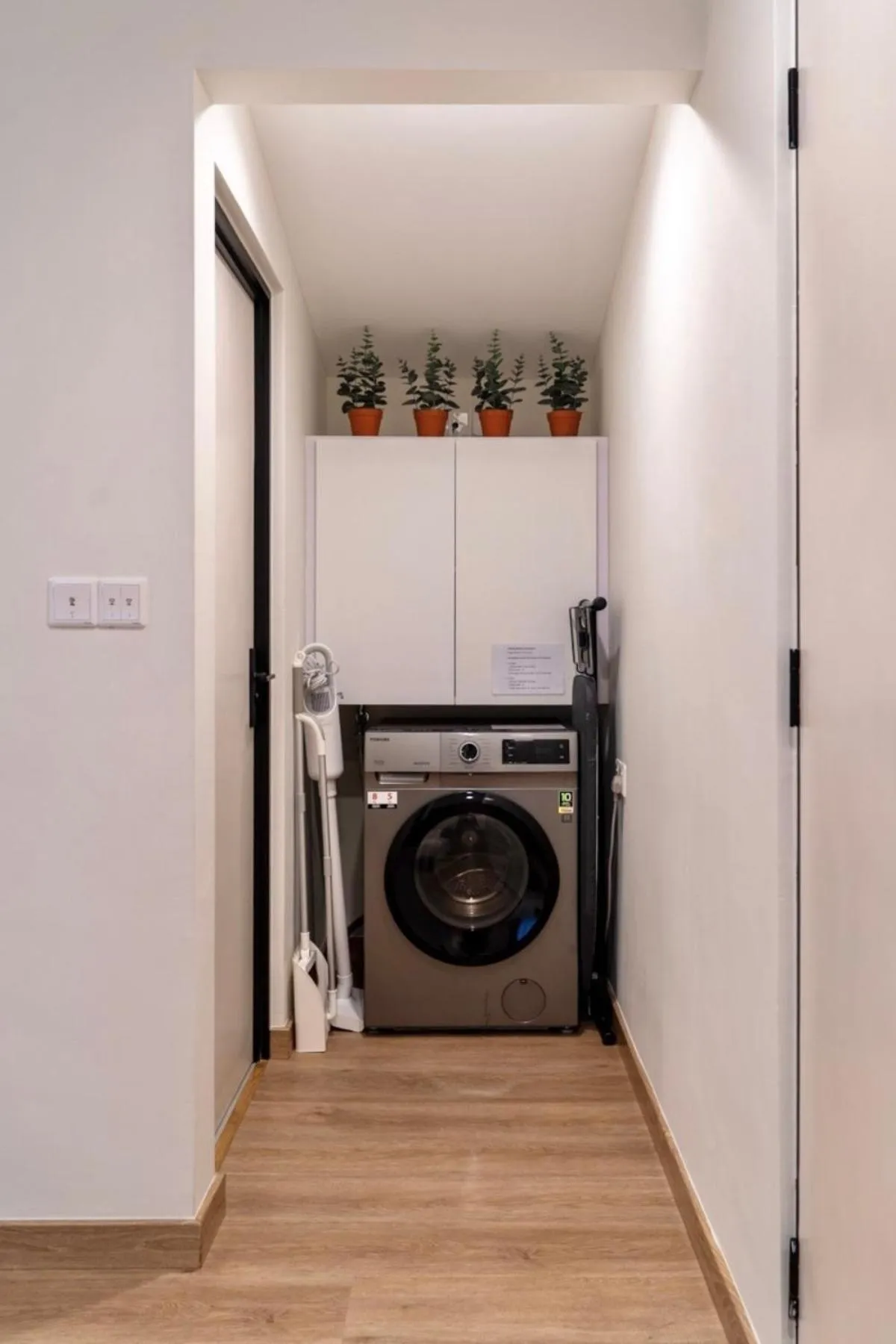 washing machine in Codrington House - Boutique Apartments