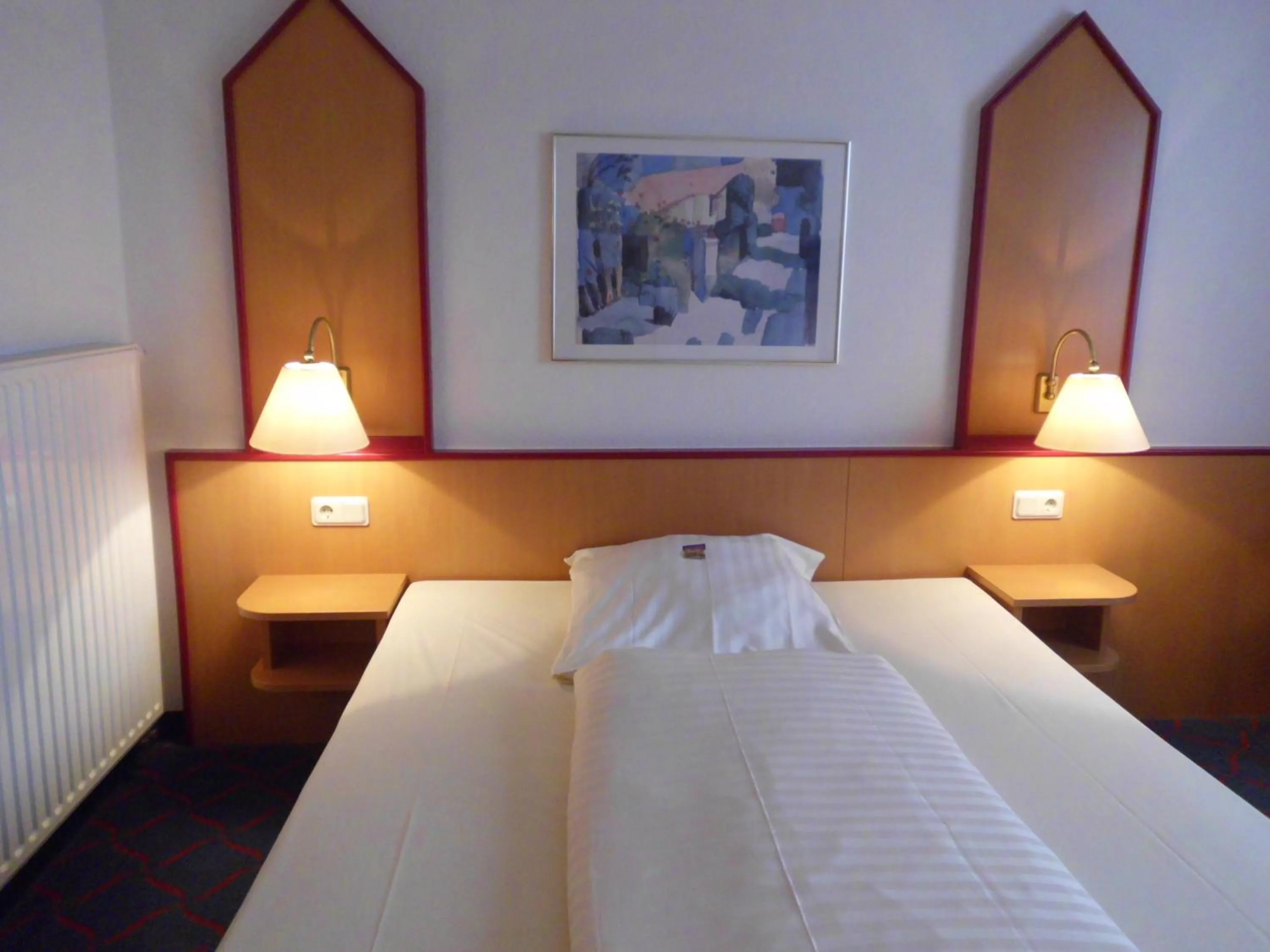 Bed in Hotel Montana Lauenau