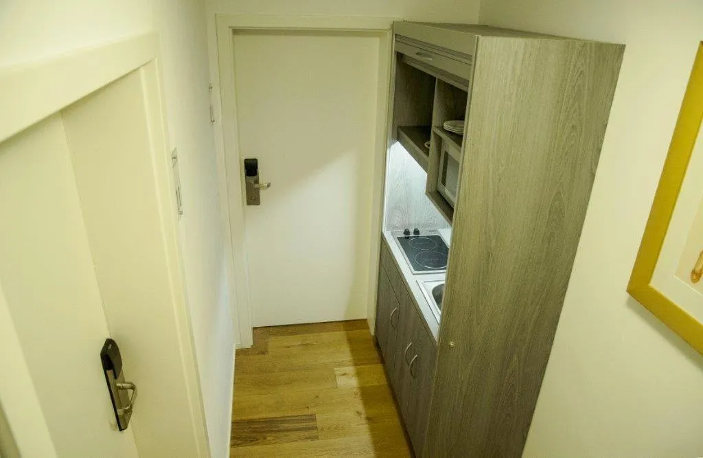 Kitchen or kitchenette in Hotel am Schloss