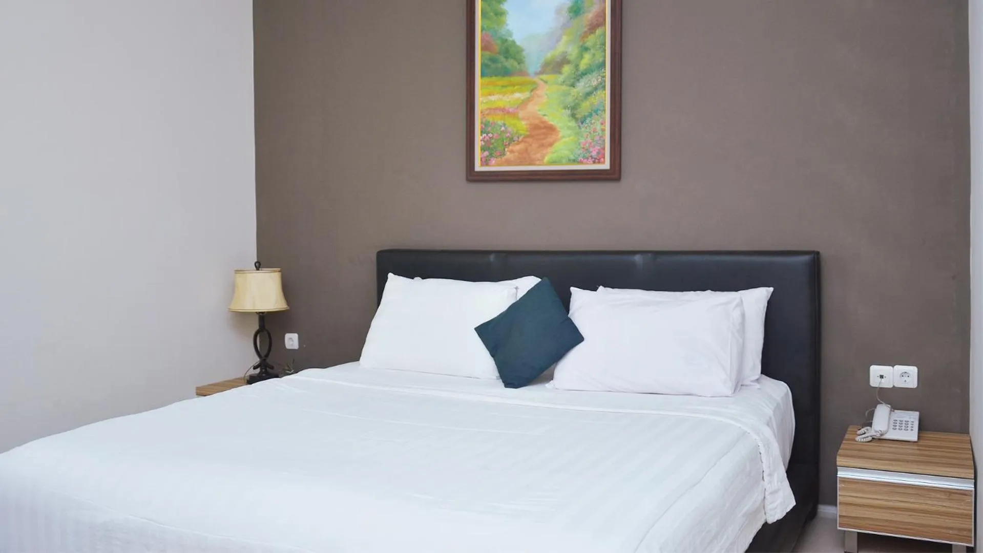 Bed in Gaia Asri Hotel