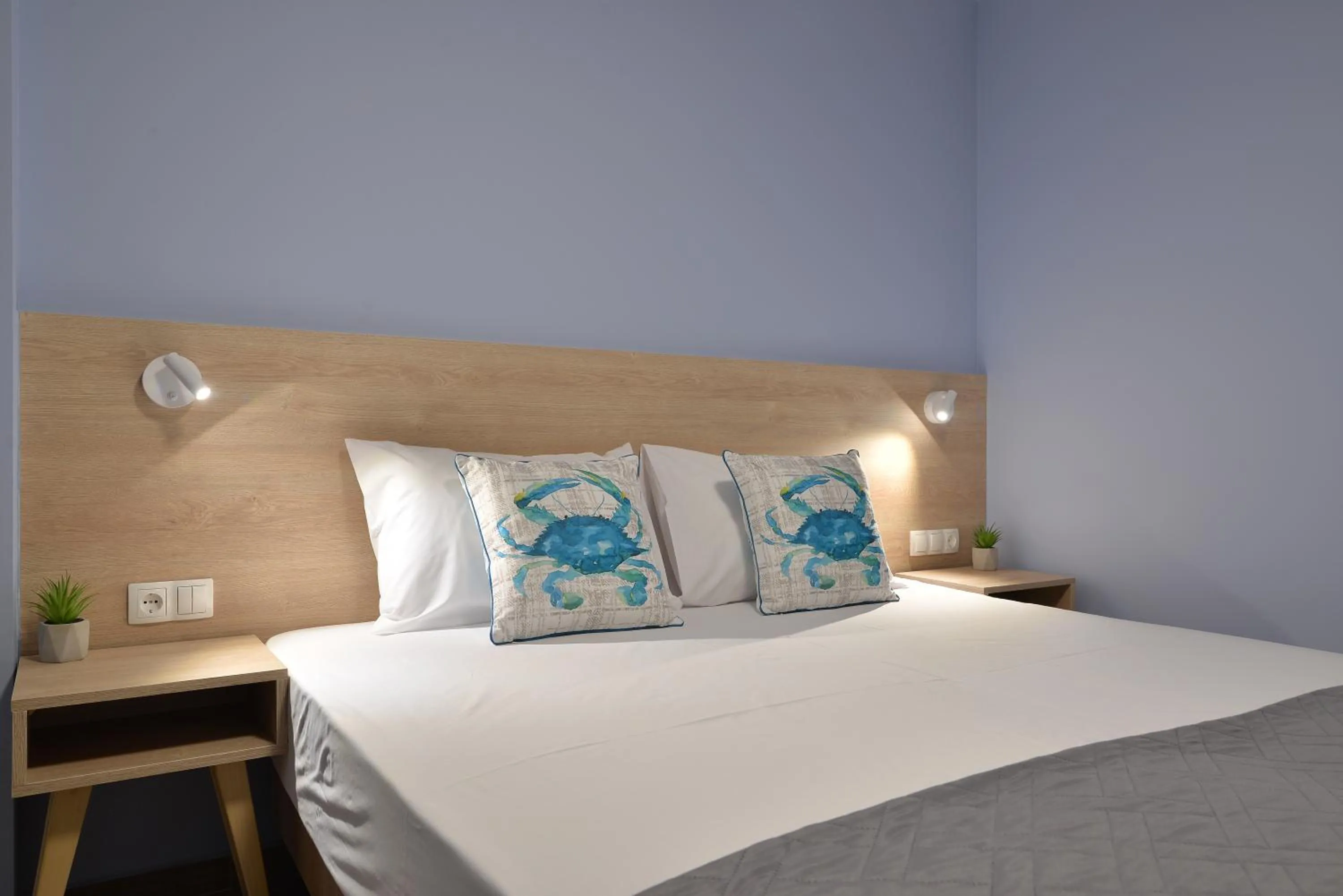 Bed in Niel Holiday Apartments, Panel Hospitality Homes & Villas