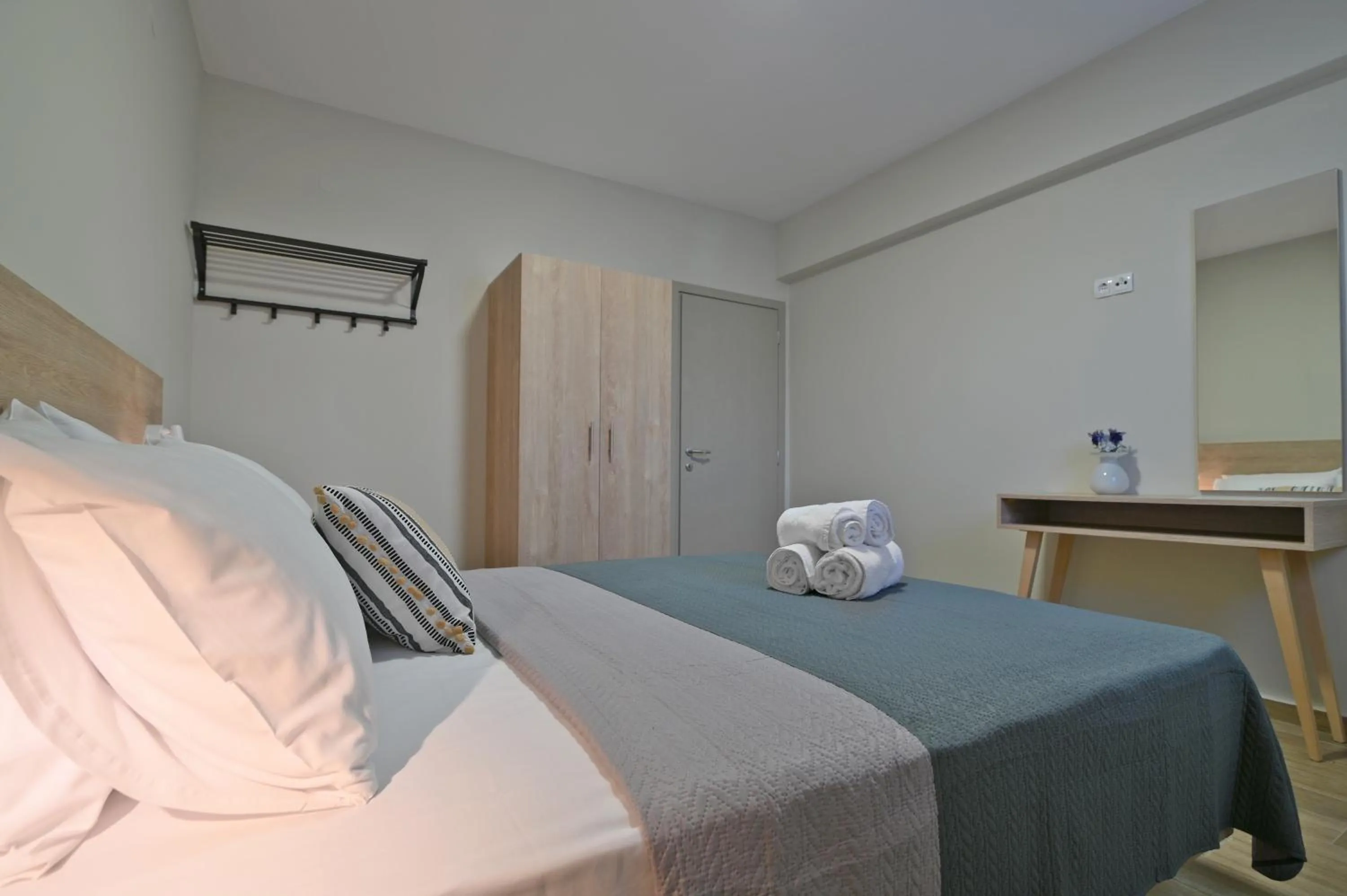 Bed in Niel Holiday Apartments, Panel Hospitality Homes & Villas