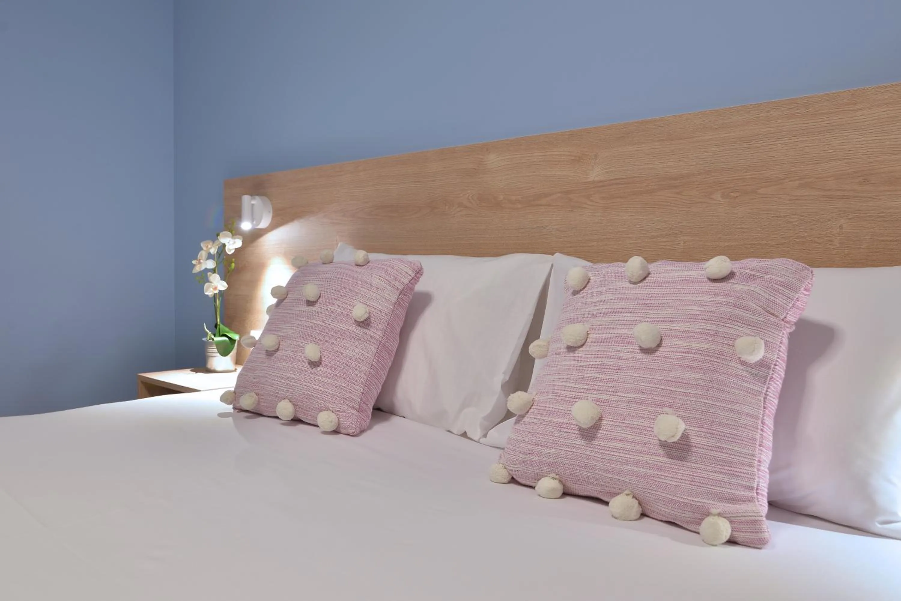 Bed in Niel Holiday Apartments, Panel Hospitality Homes & Villas