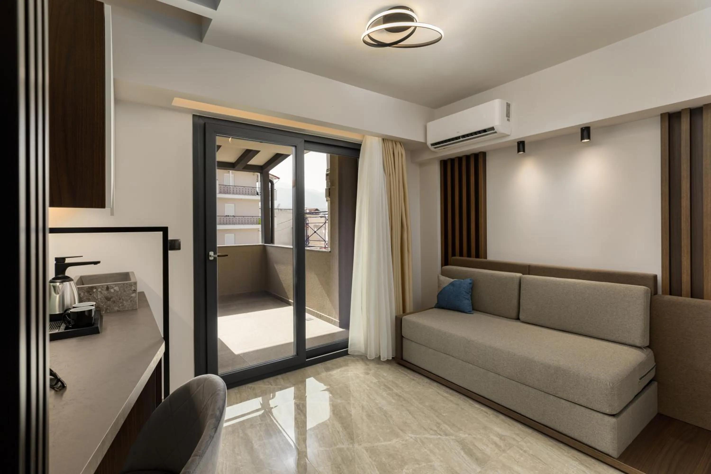 Living room, Bed in Costa De Luxe Suites