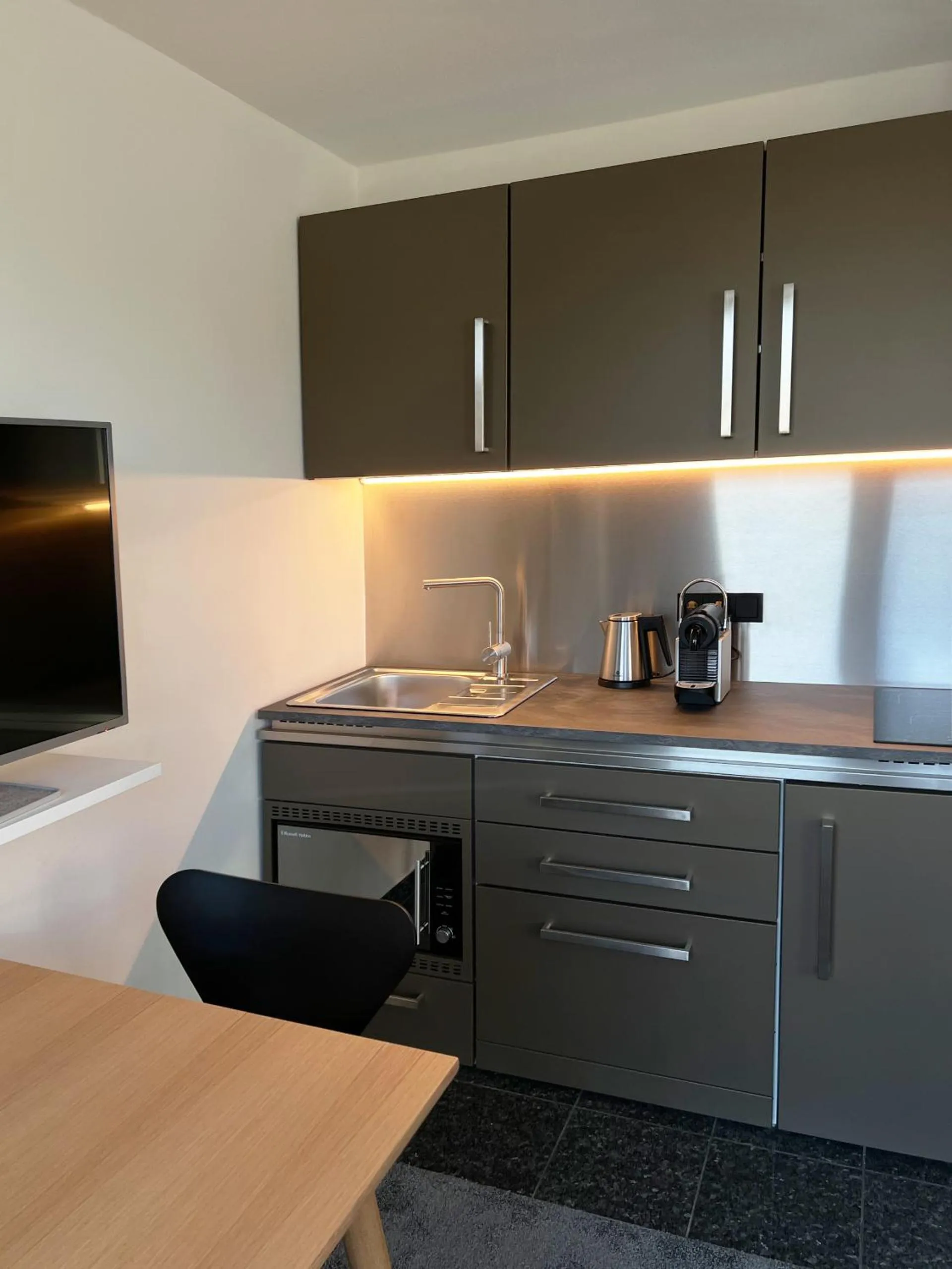 Kitchen or kitchenette in AvidonApartments