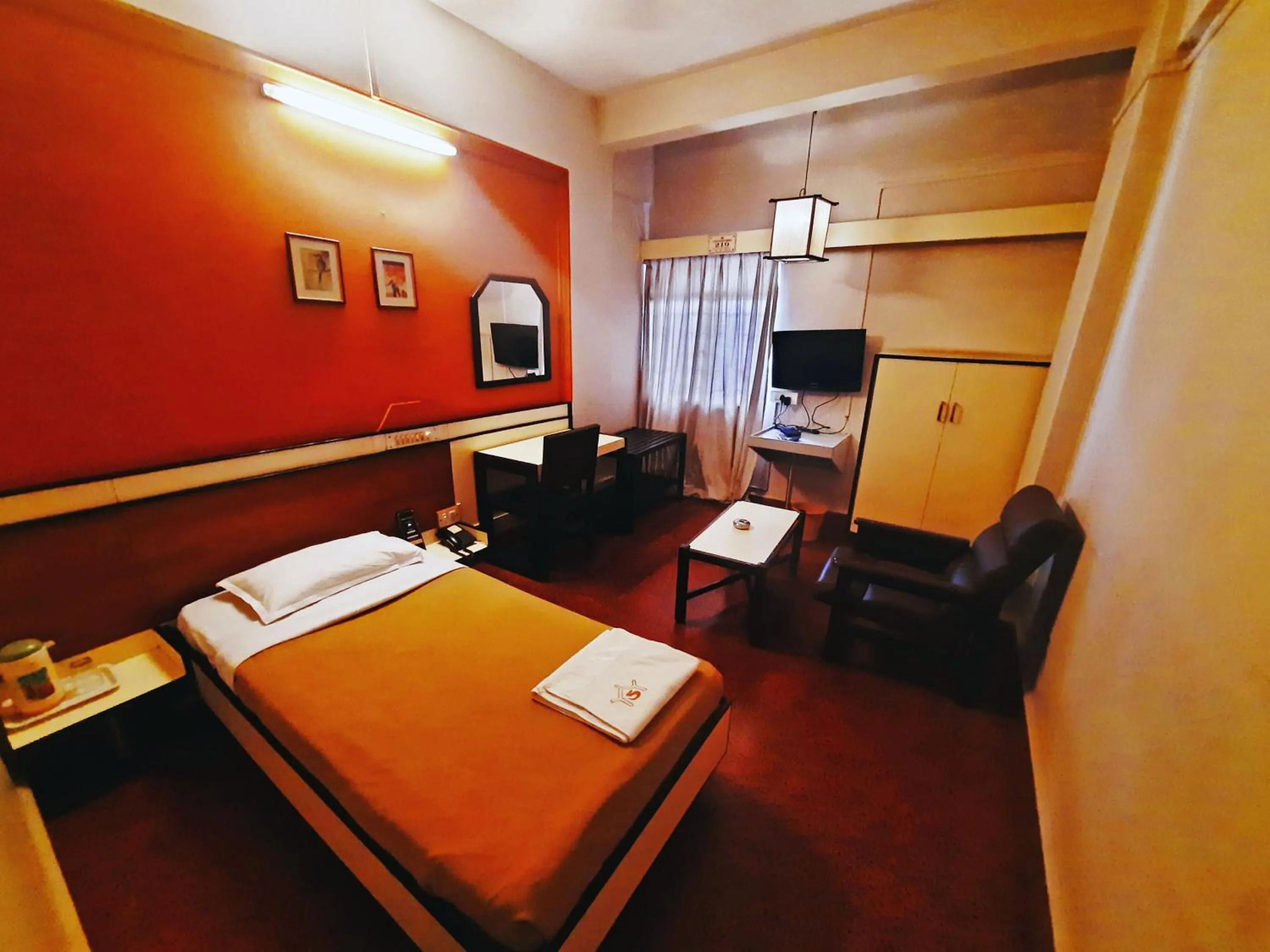 Bedroom in Sanman Deluxe Lodge