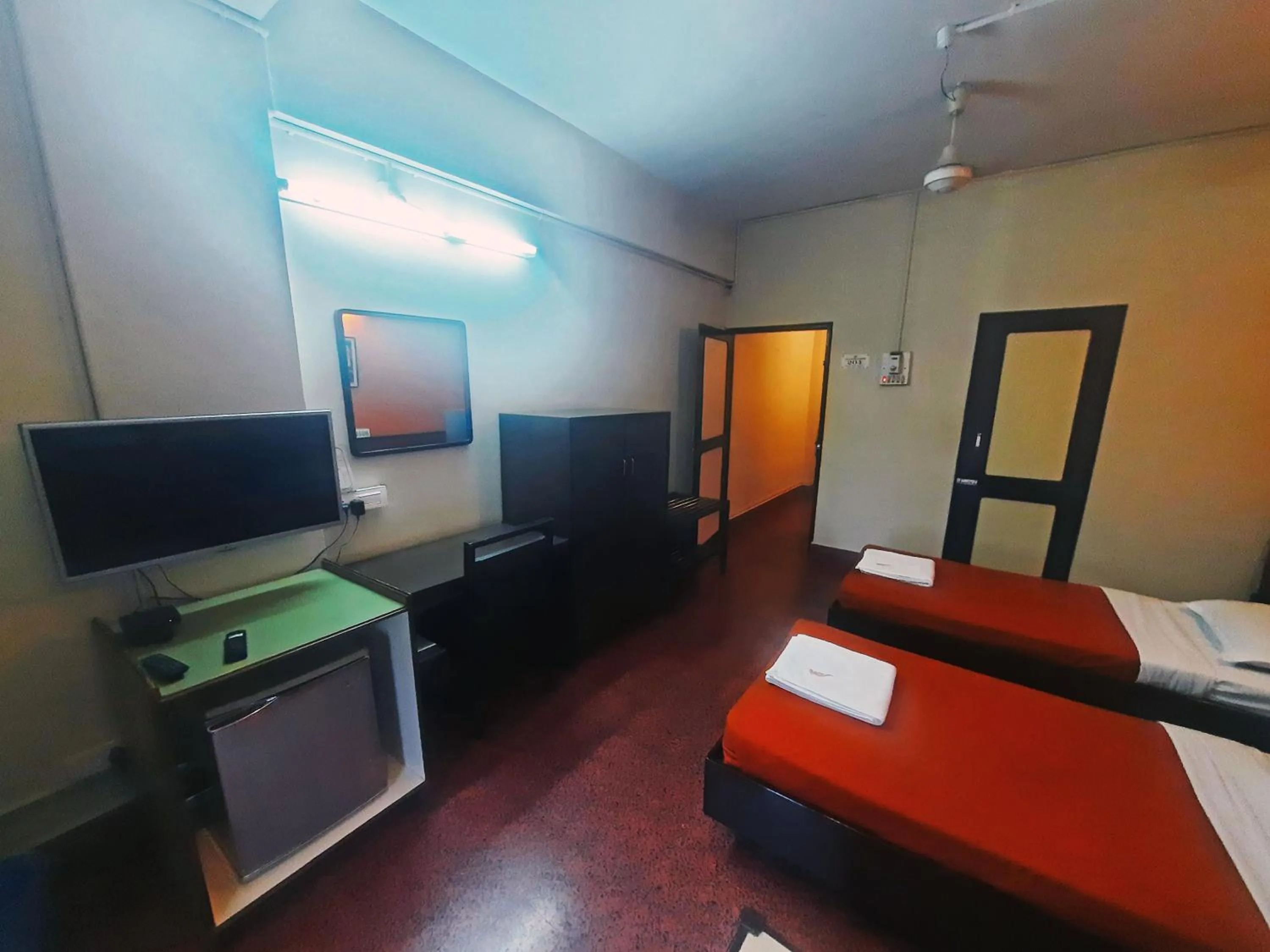 Bedroom in Sanman Deluxe Lodge