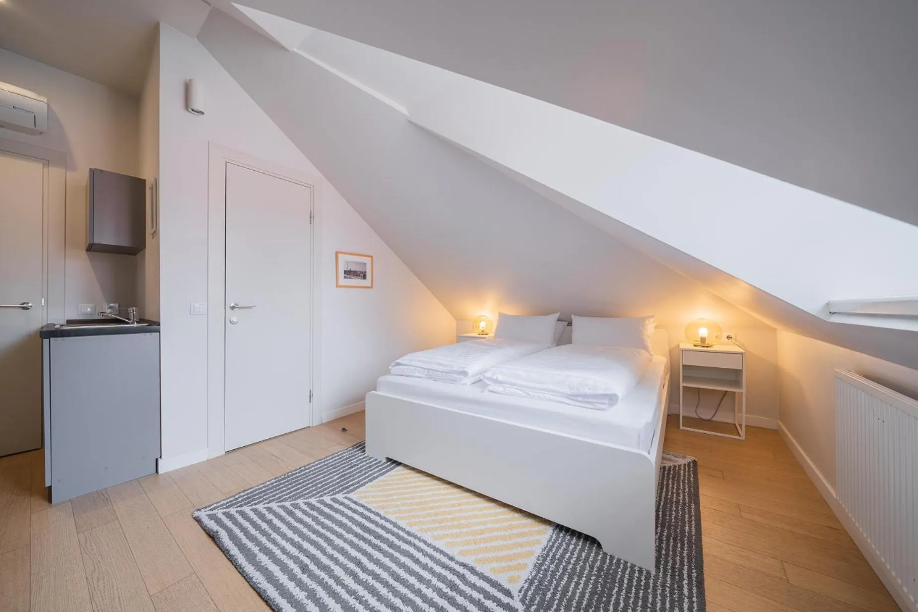 Bed in Lollo Luxury Residence - Lollo Stay