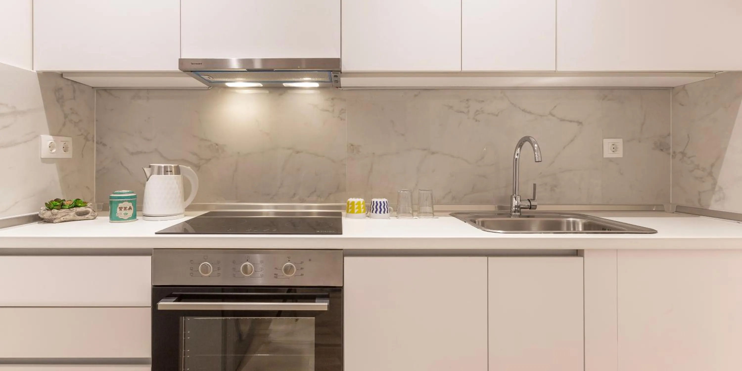 kitchen in The Caravan Apartments