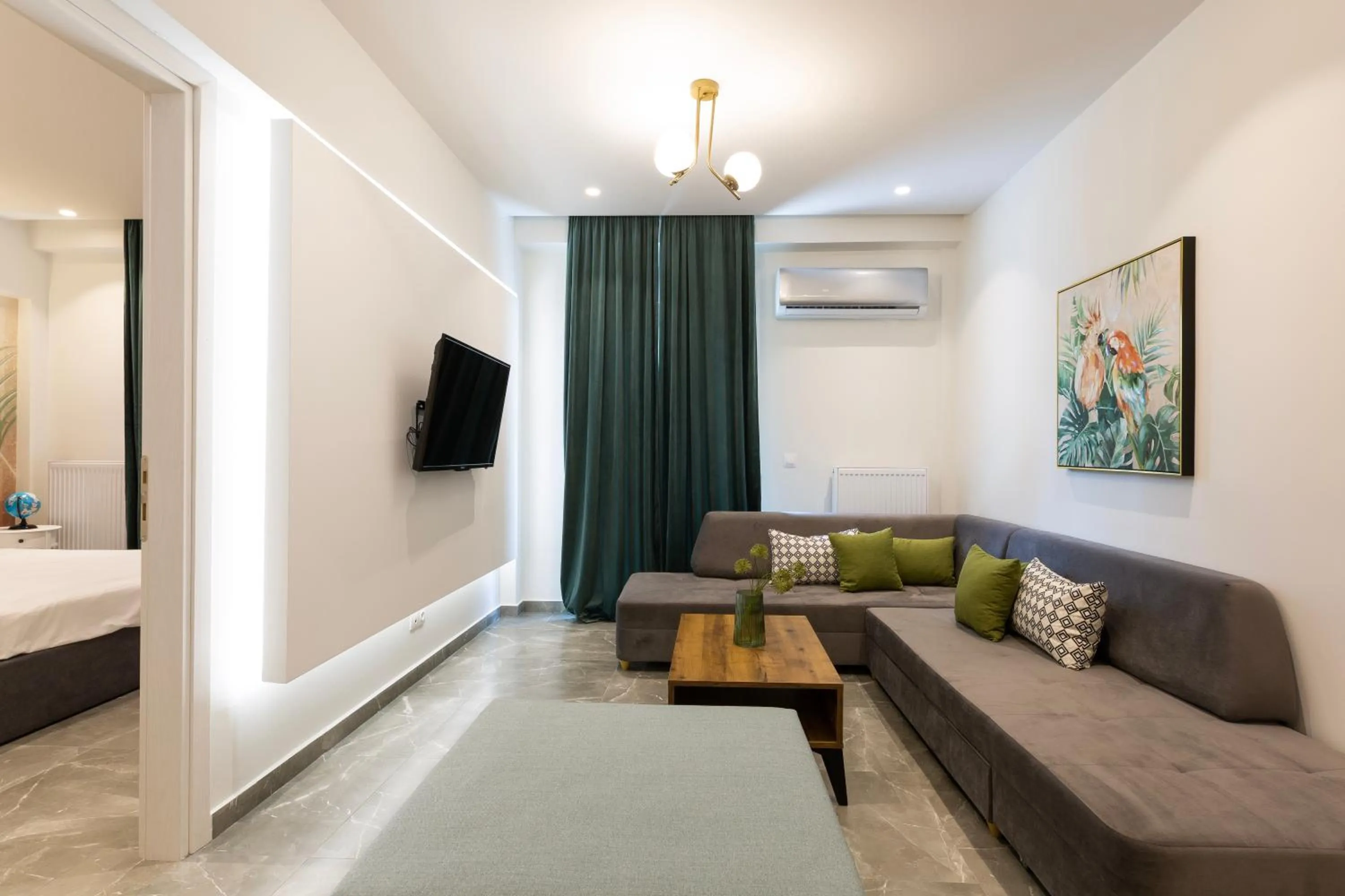 Living room, Bed in The Caravan Apartments