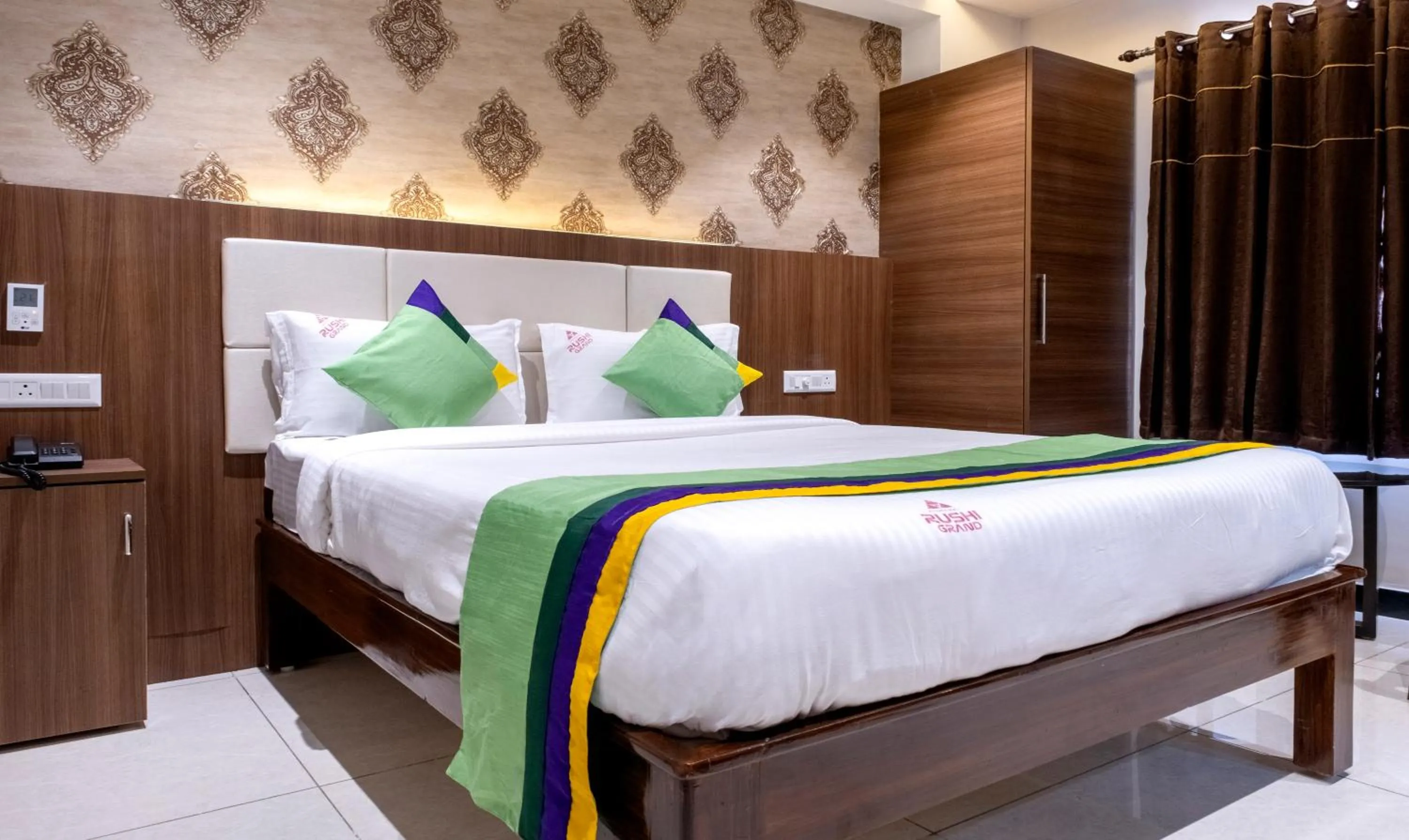 Bedroom, Bed in Treebo Rushi Grand