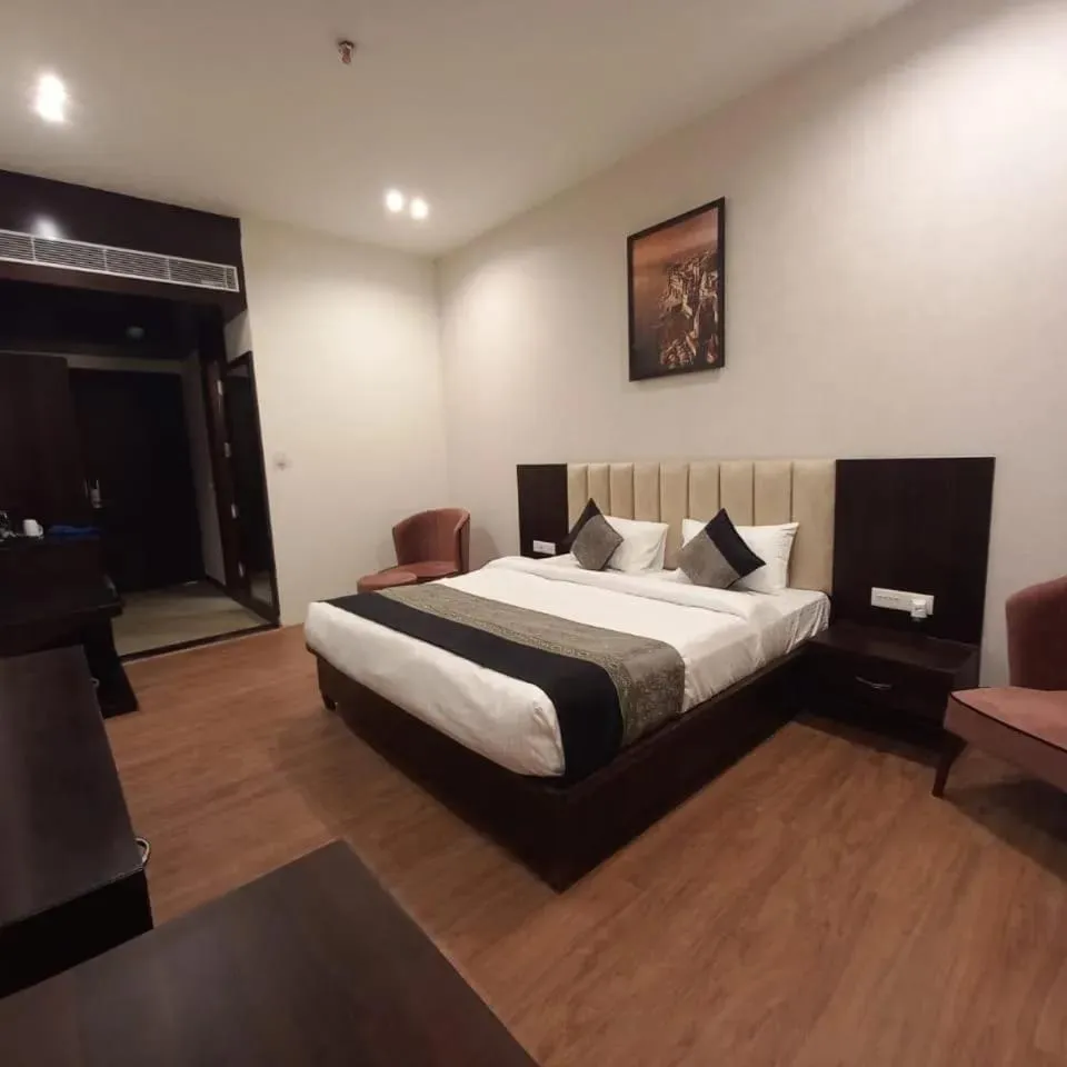 Bed in HOTEL DHAROHAR