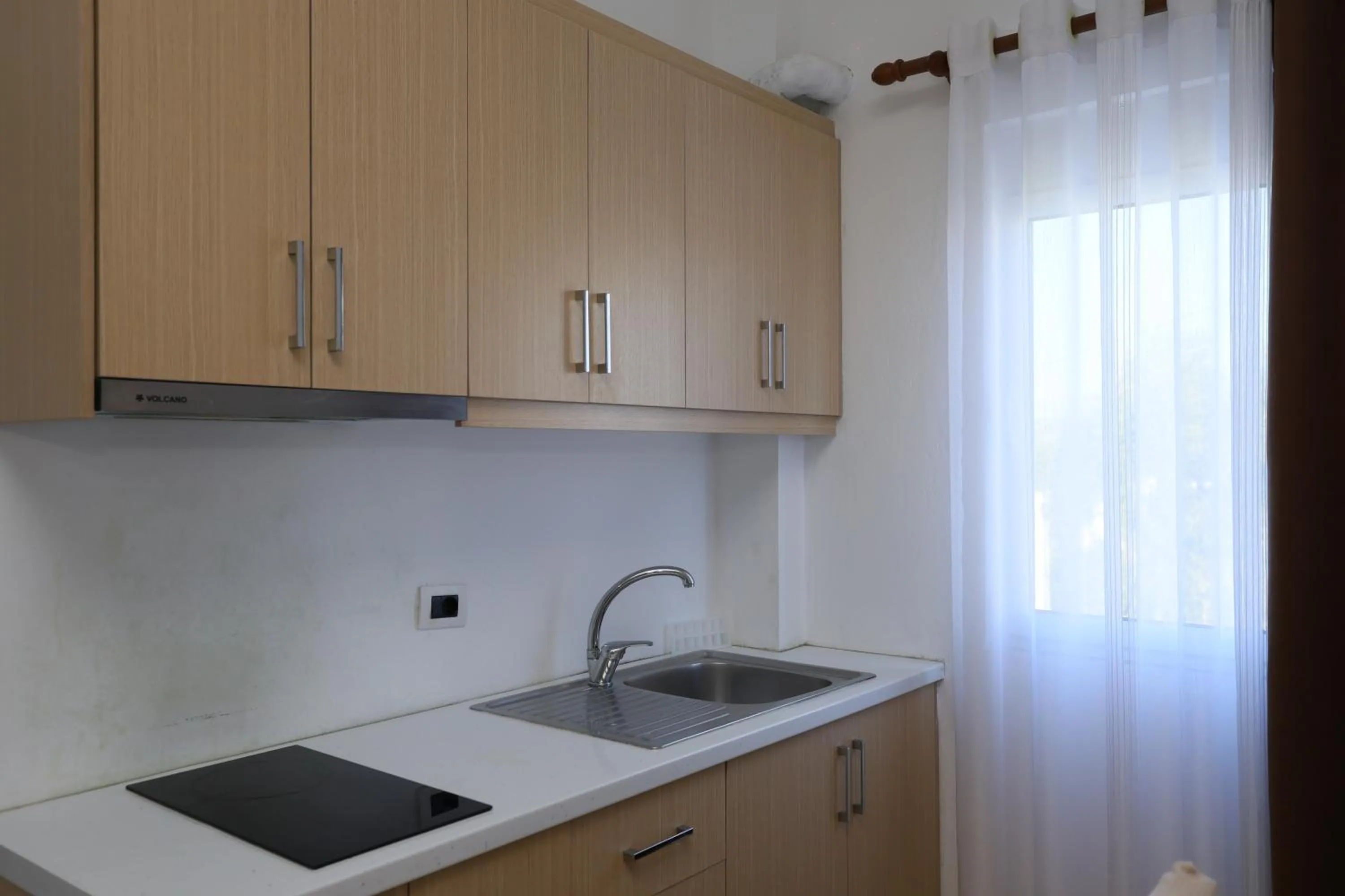 Kitchen or kitchenette in Michelle Apartments
