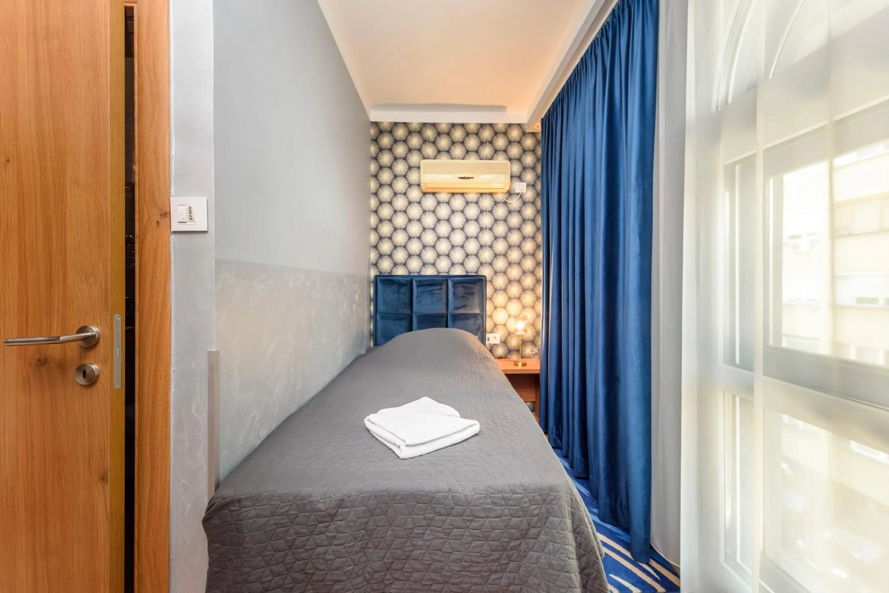 Bed in Garni Hotel Zenit