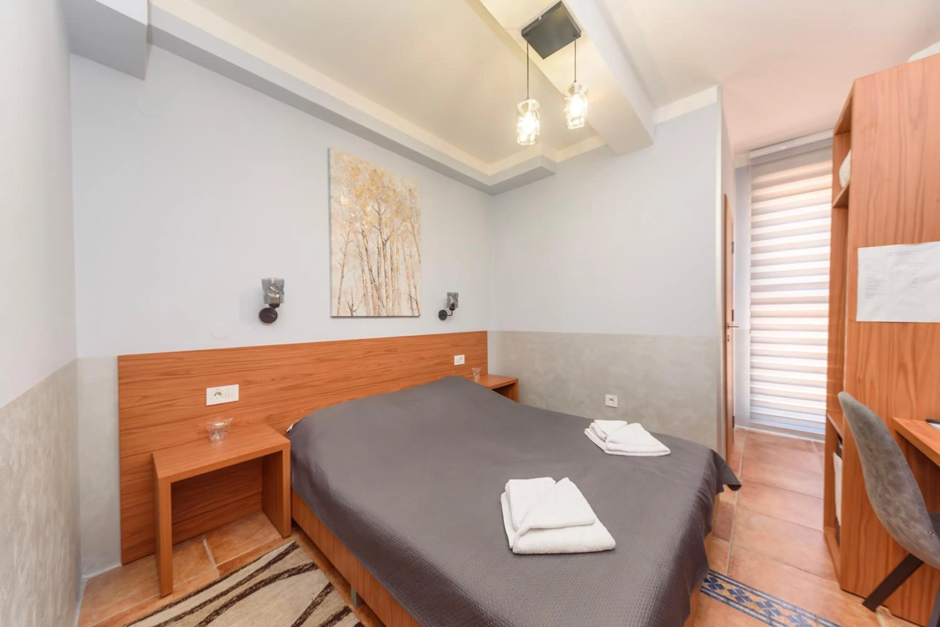 Bed in Garni Hotel Zenit