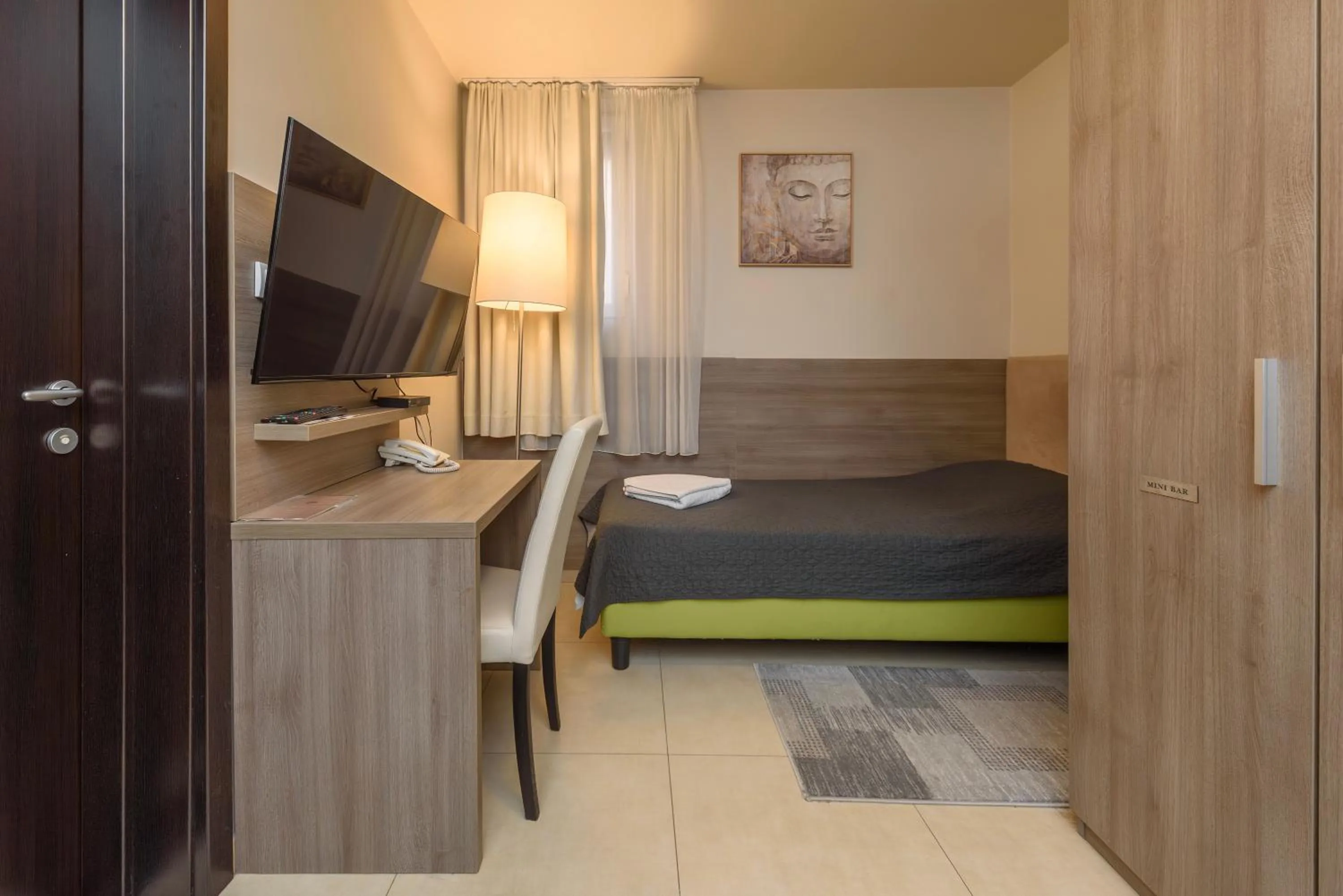 Bed in Garni Hotel Zenit