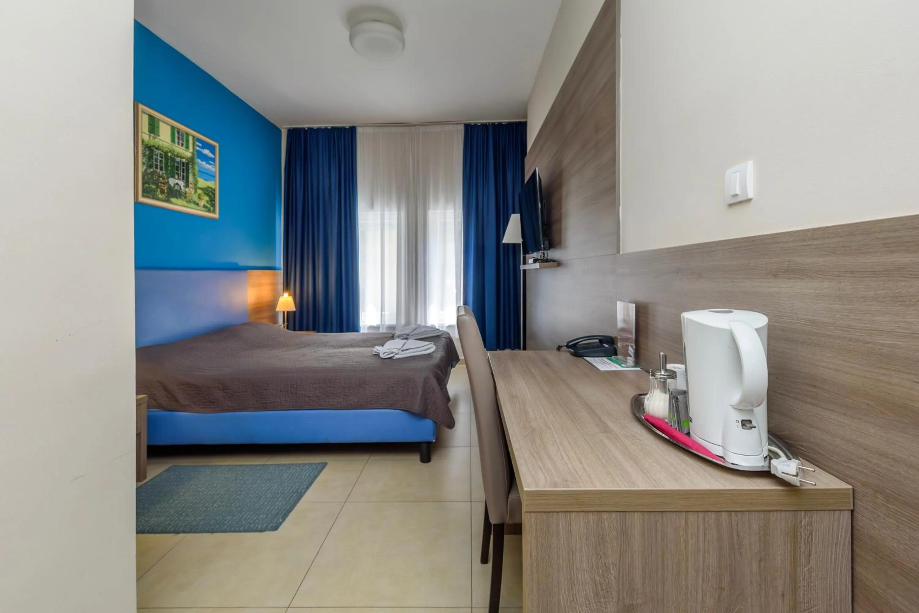 Bed in Garni Hotel Zenit