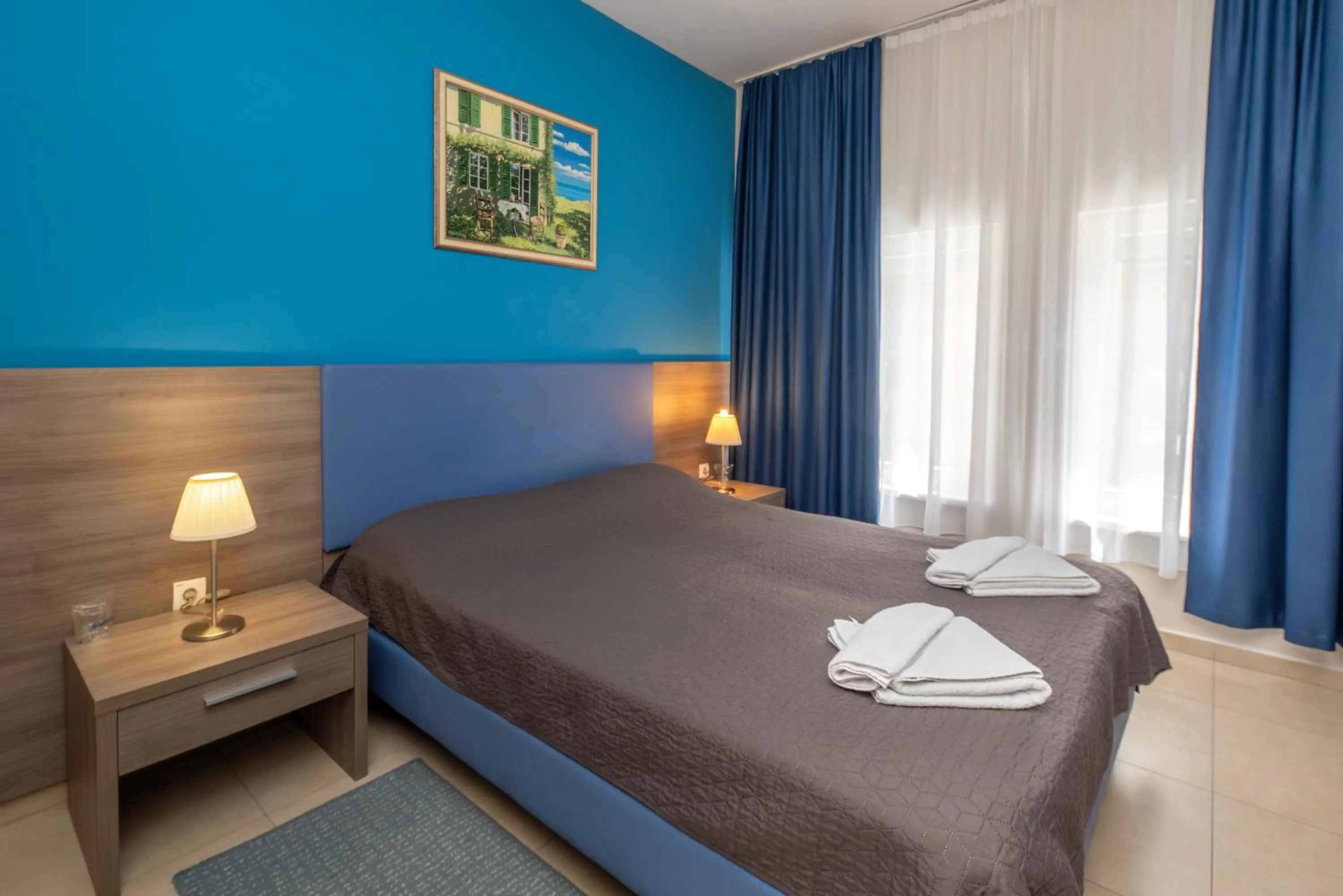 Bed in Garni Hotel Zenit