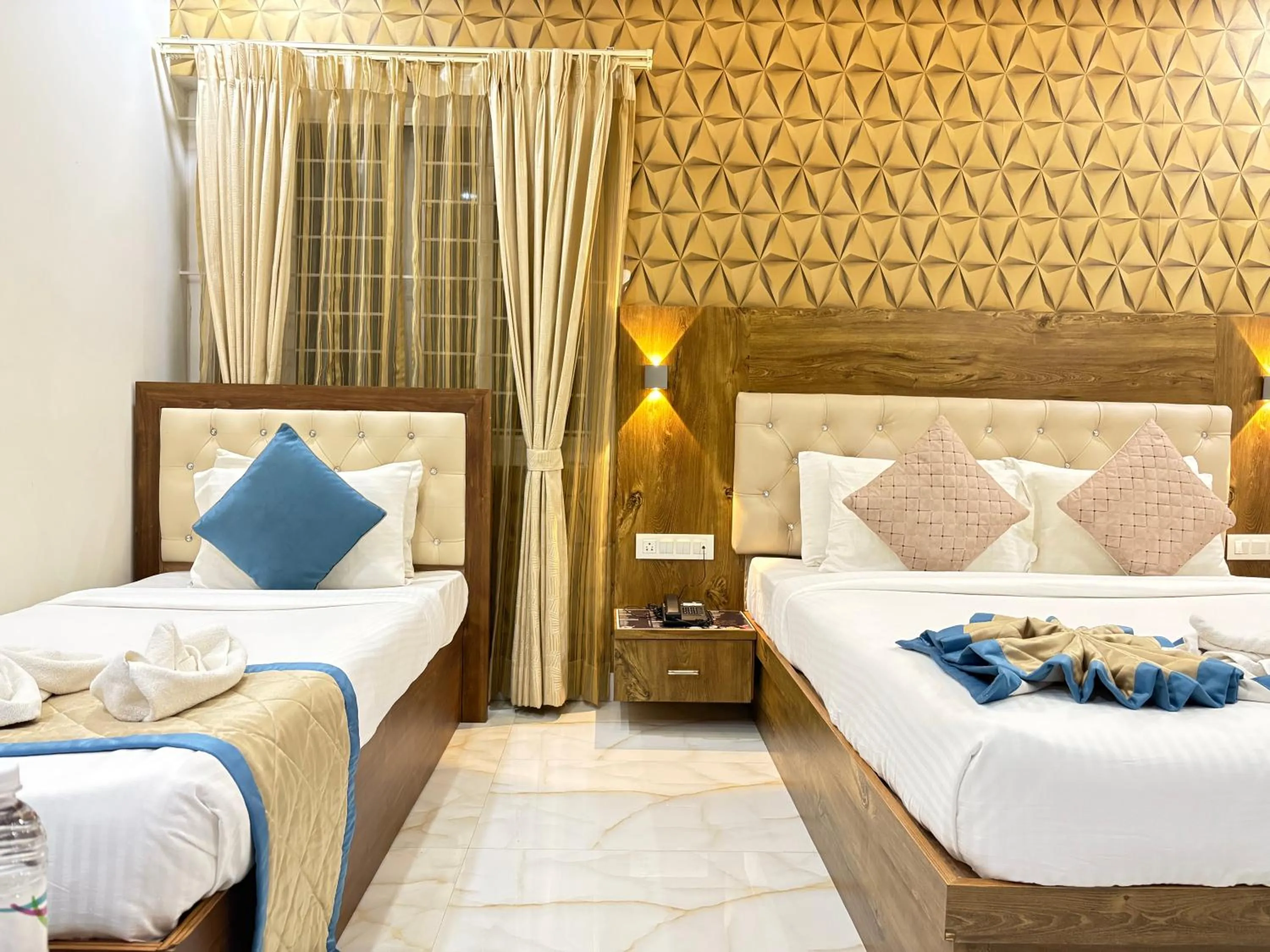 Bed in Spectra Hotel Bangalore Airport