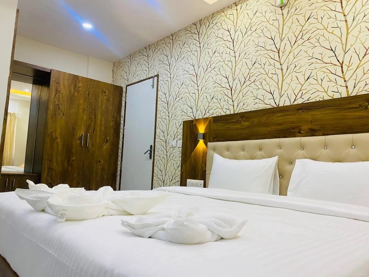 Bed in Spectra Hotel Bangalore Airport