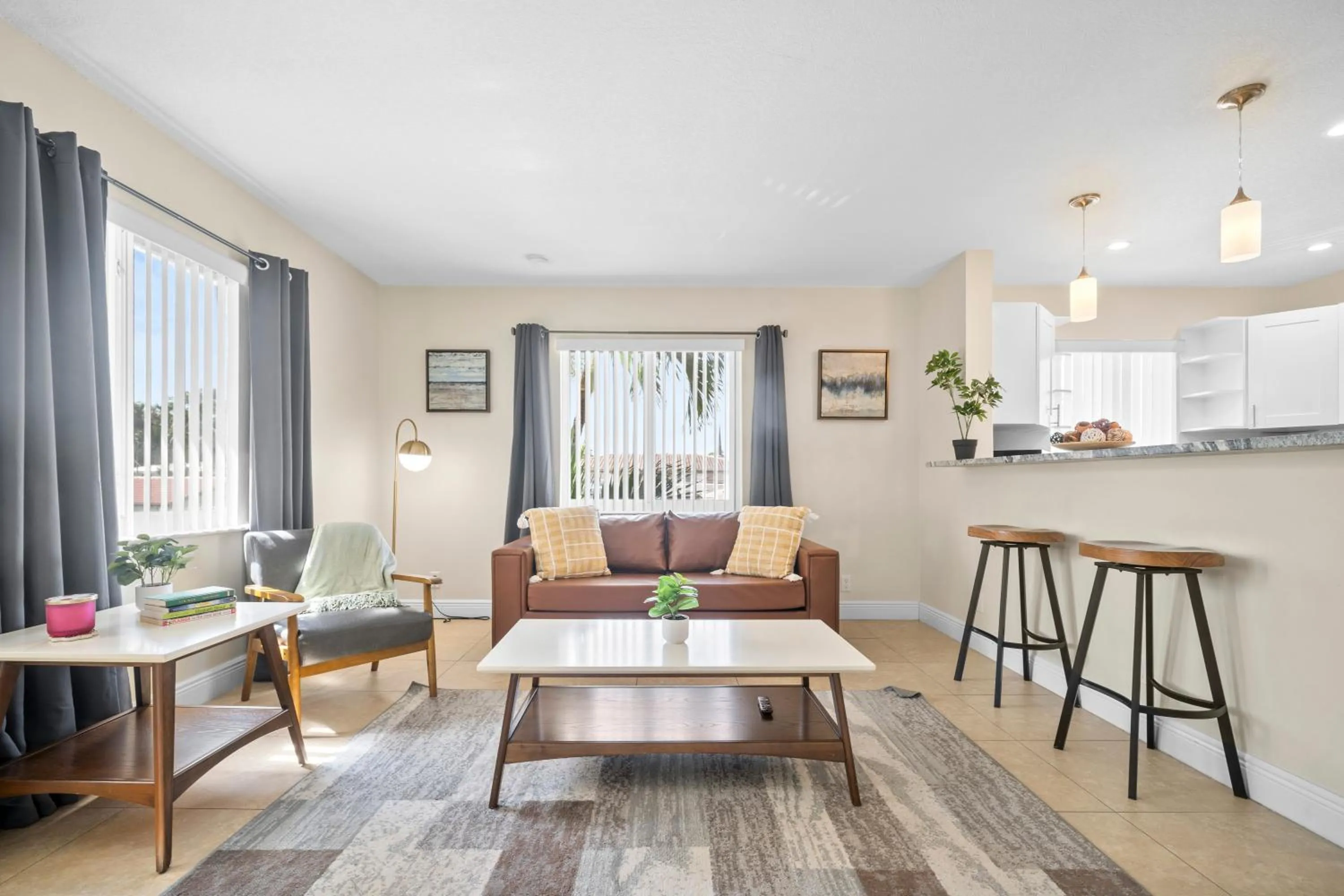 Living room in Coco Palms Apartments By Lowkl