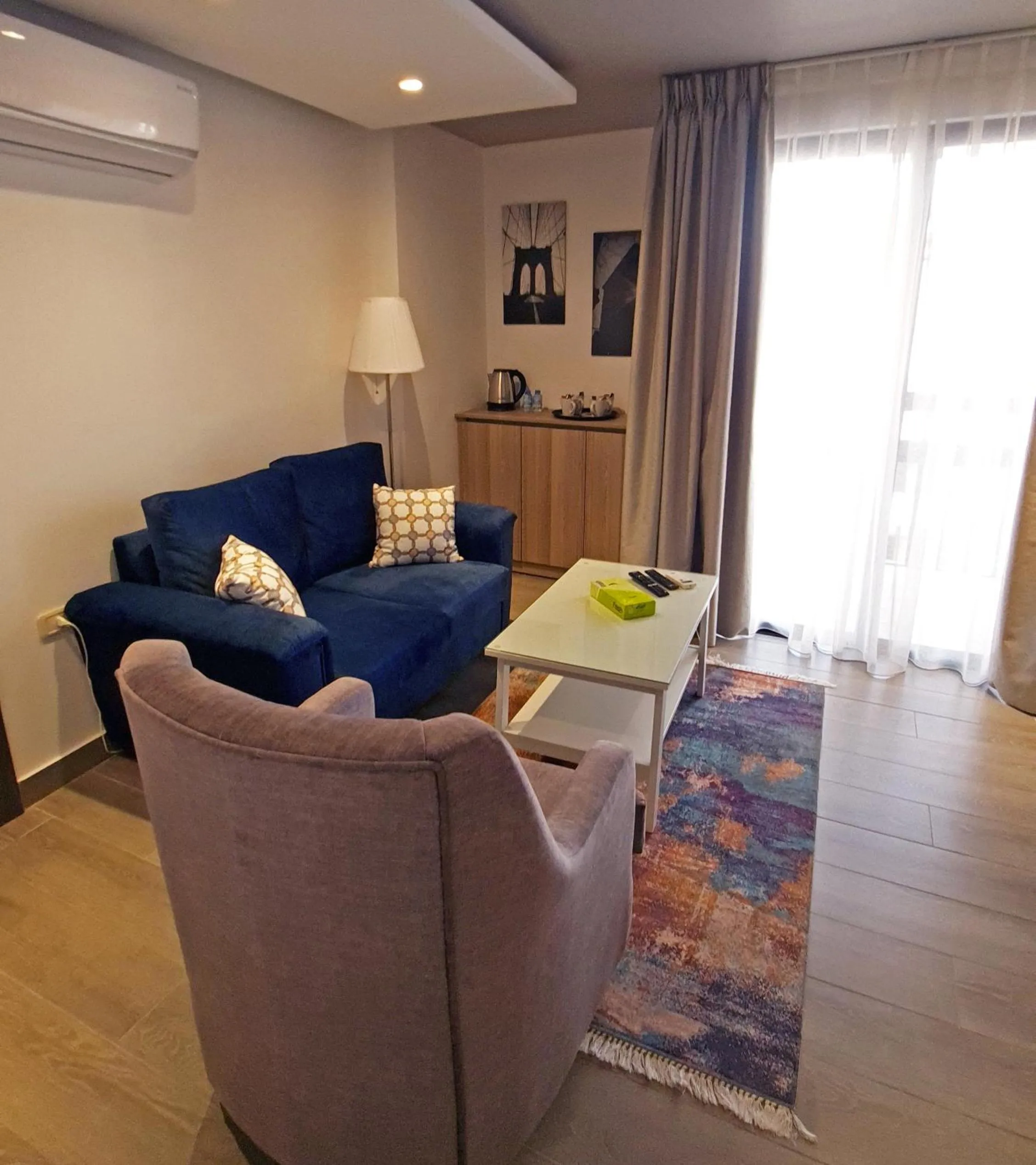 Seating area in Red Carpet Hotel & Suites