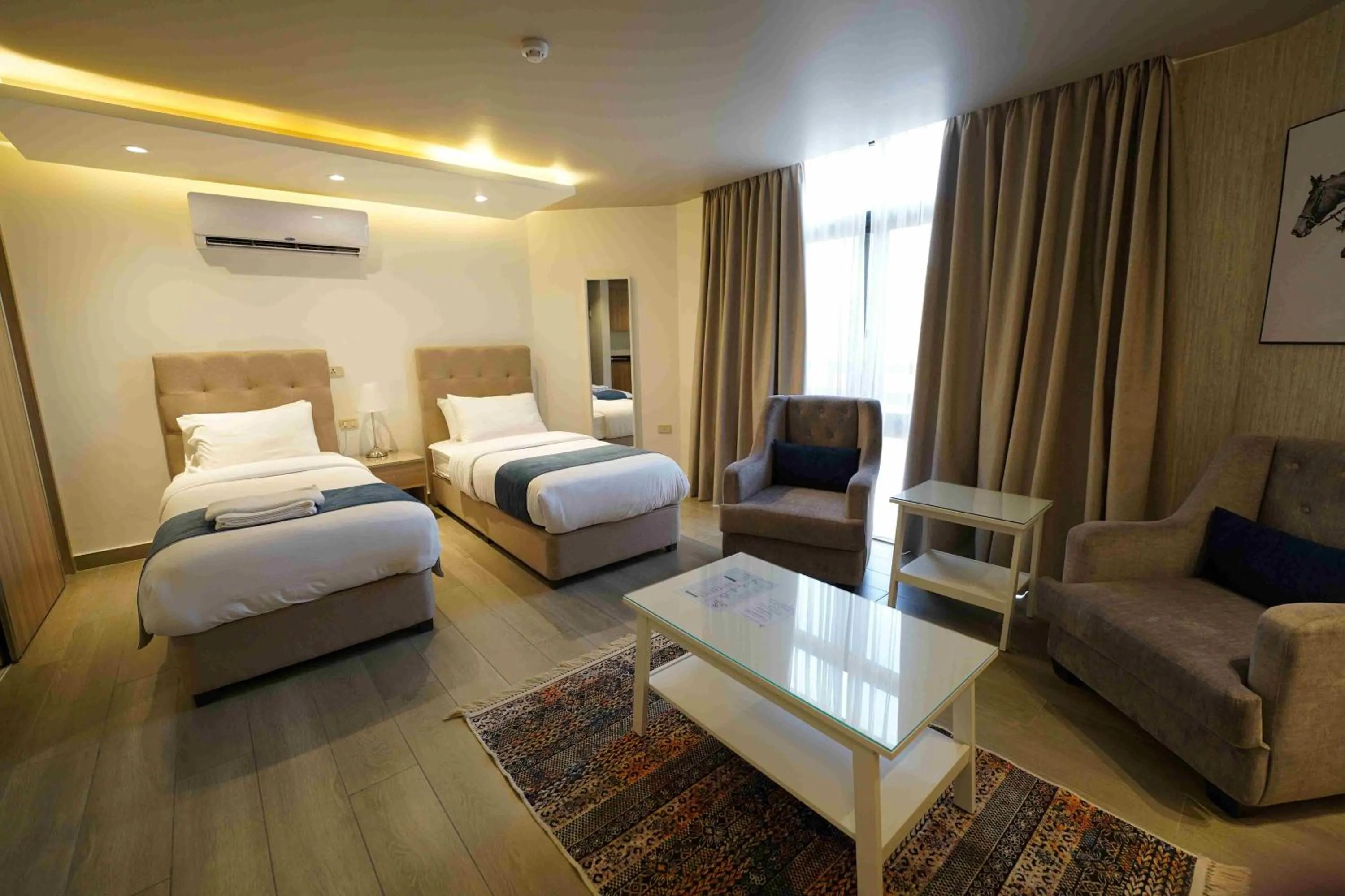 Photo of the whole room, Bed in Red Carpet Hotel & Suites