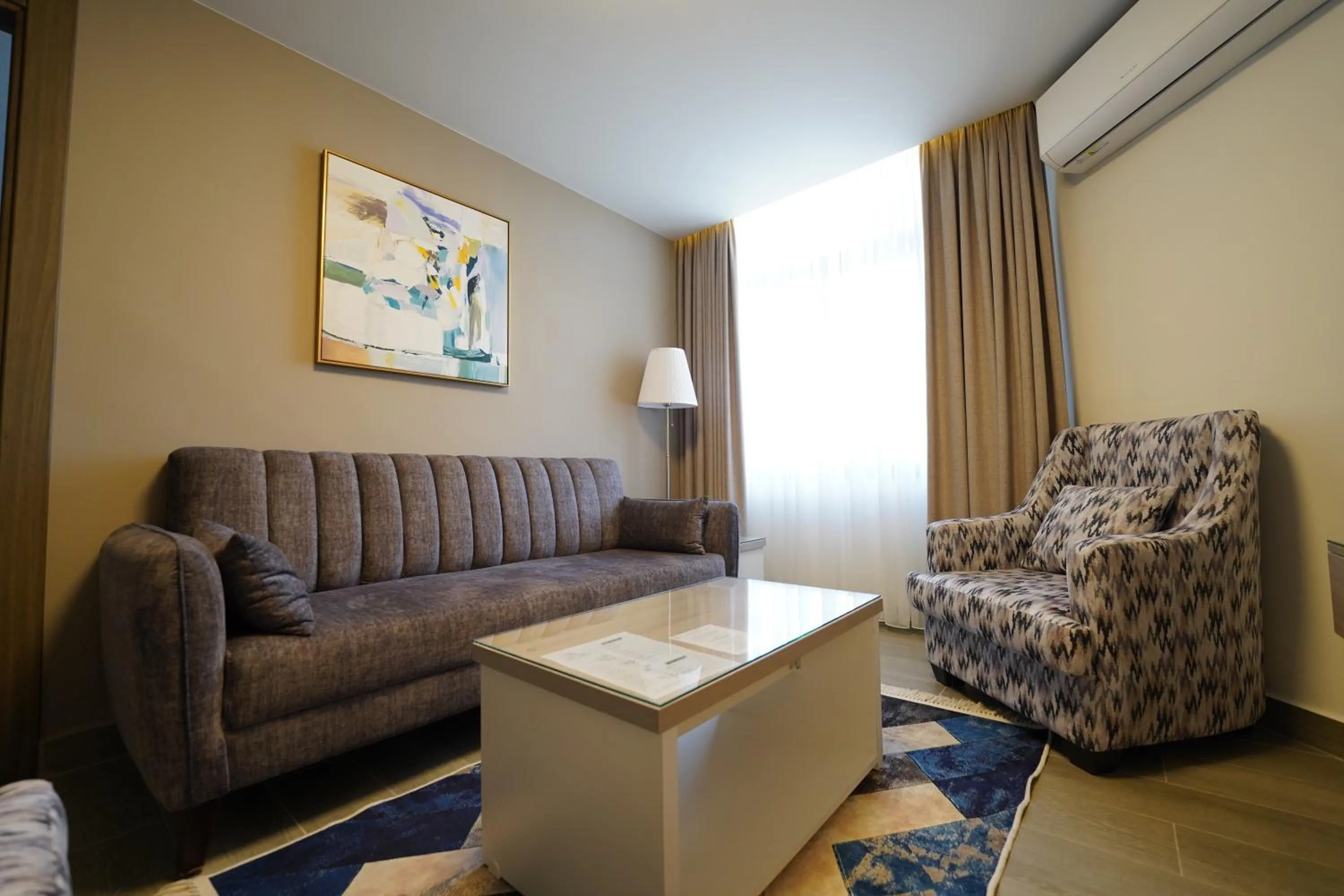 Living room in Red Carpet Hotel & Suites