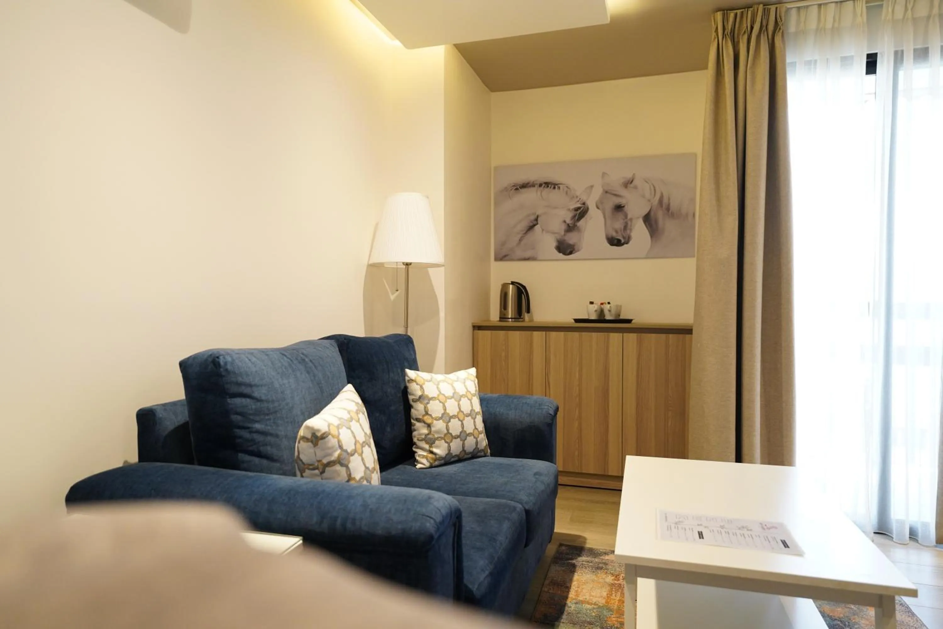 Living room in Red Carpet Hotel & Suites