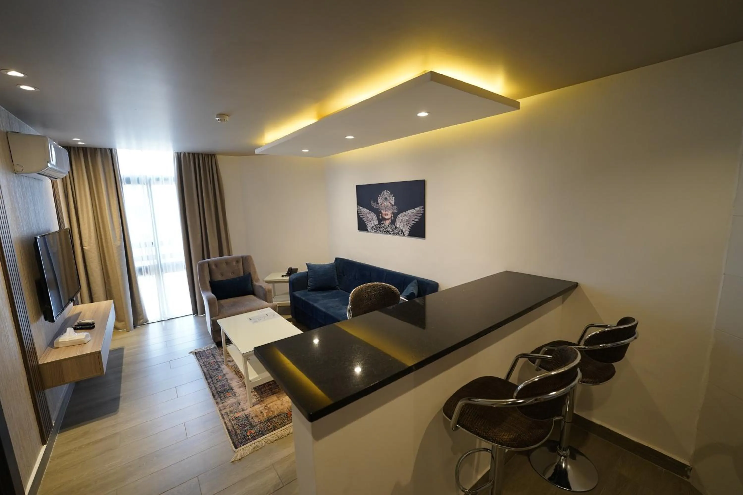 Living room in Red Carpet Hotel & Suites