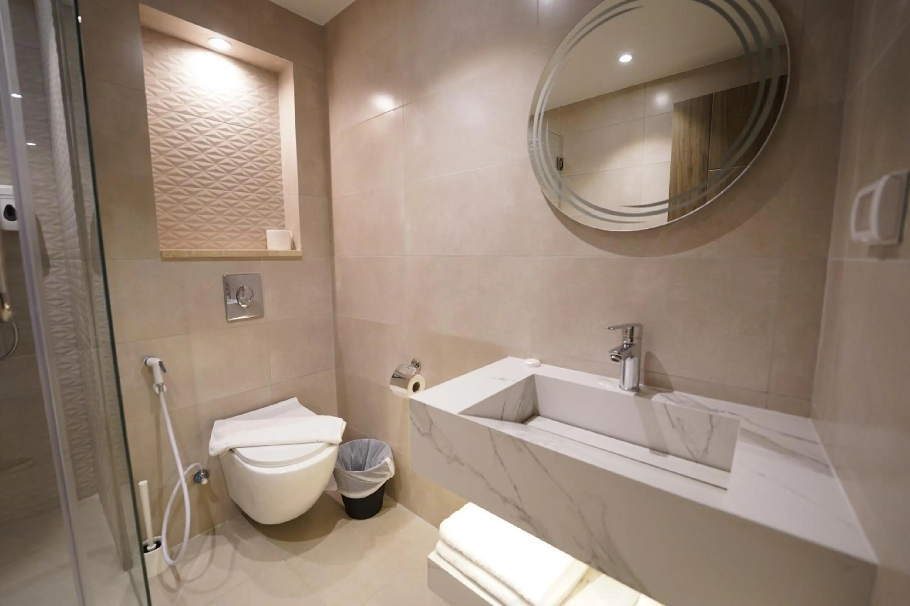 Toilet in Red Carpet Hotel & Suites