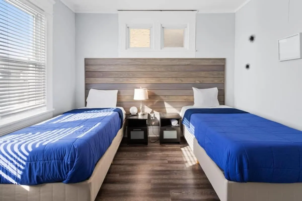 Bed in 3 Beachfront Apts with 12BR 6BA in AC