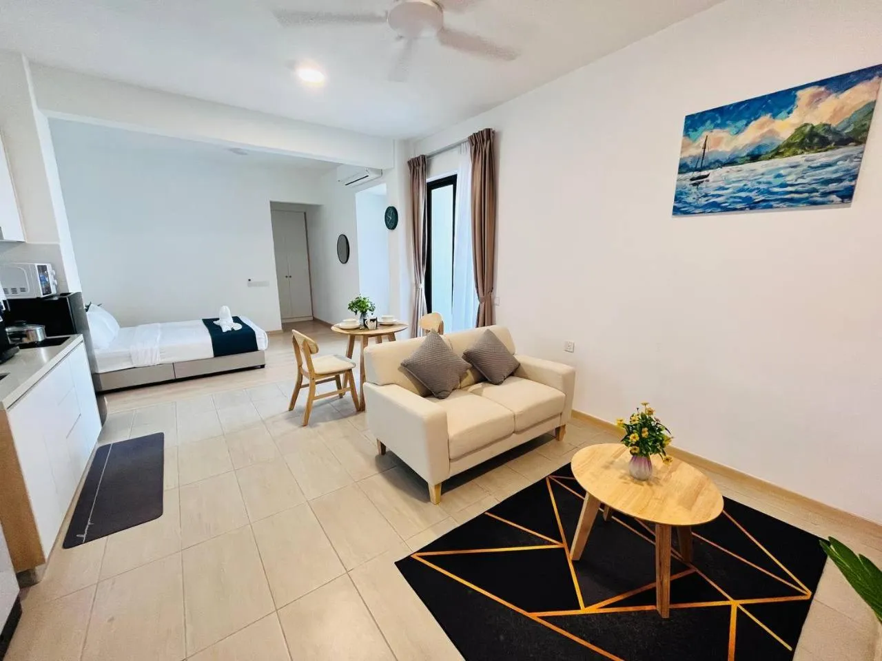 Living room in Mutiara Melaka Beach Paradise by Glex