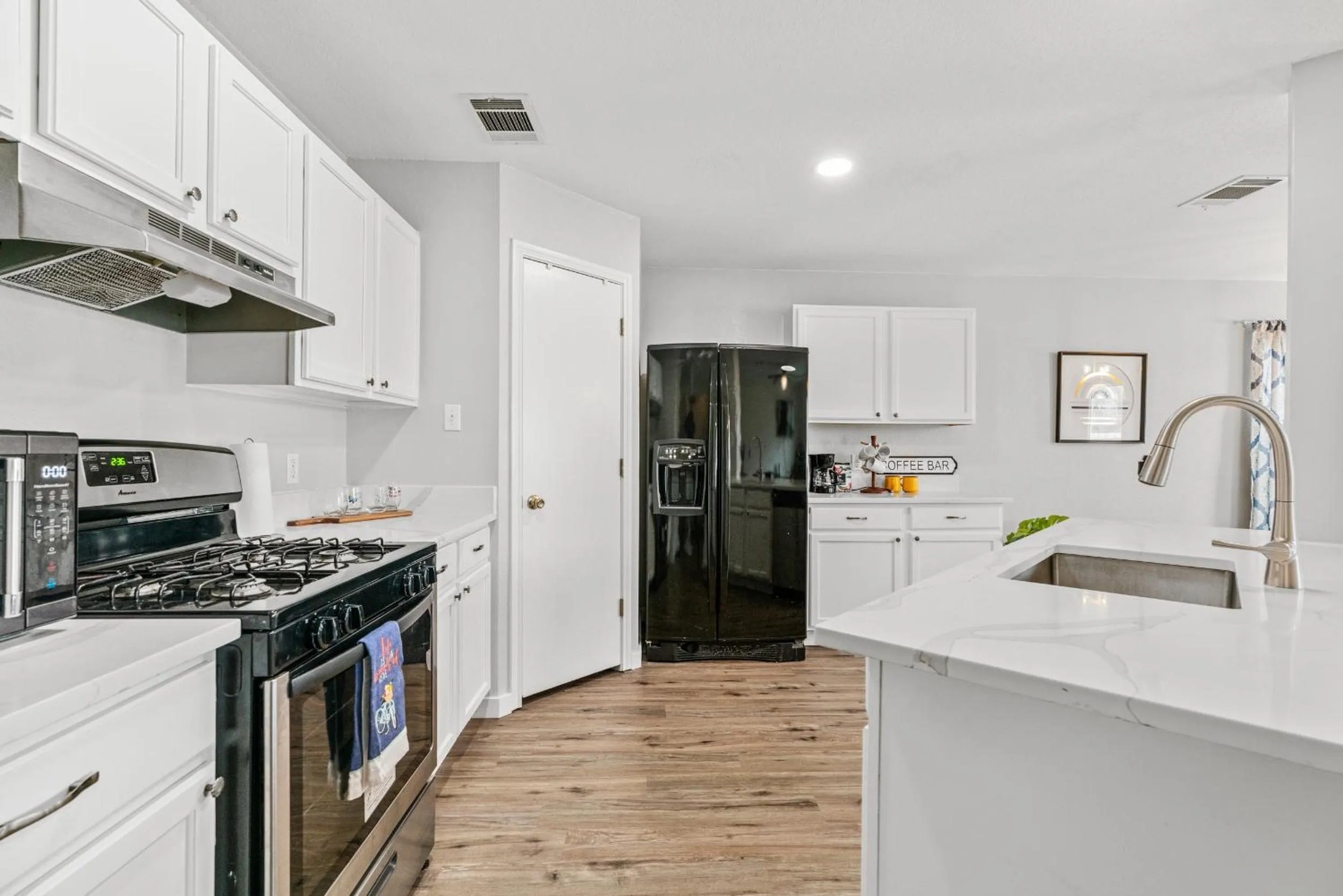 Kitchen or kitchenette in Modern, family friendly home w garage, huge yard!