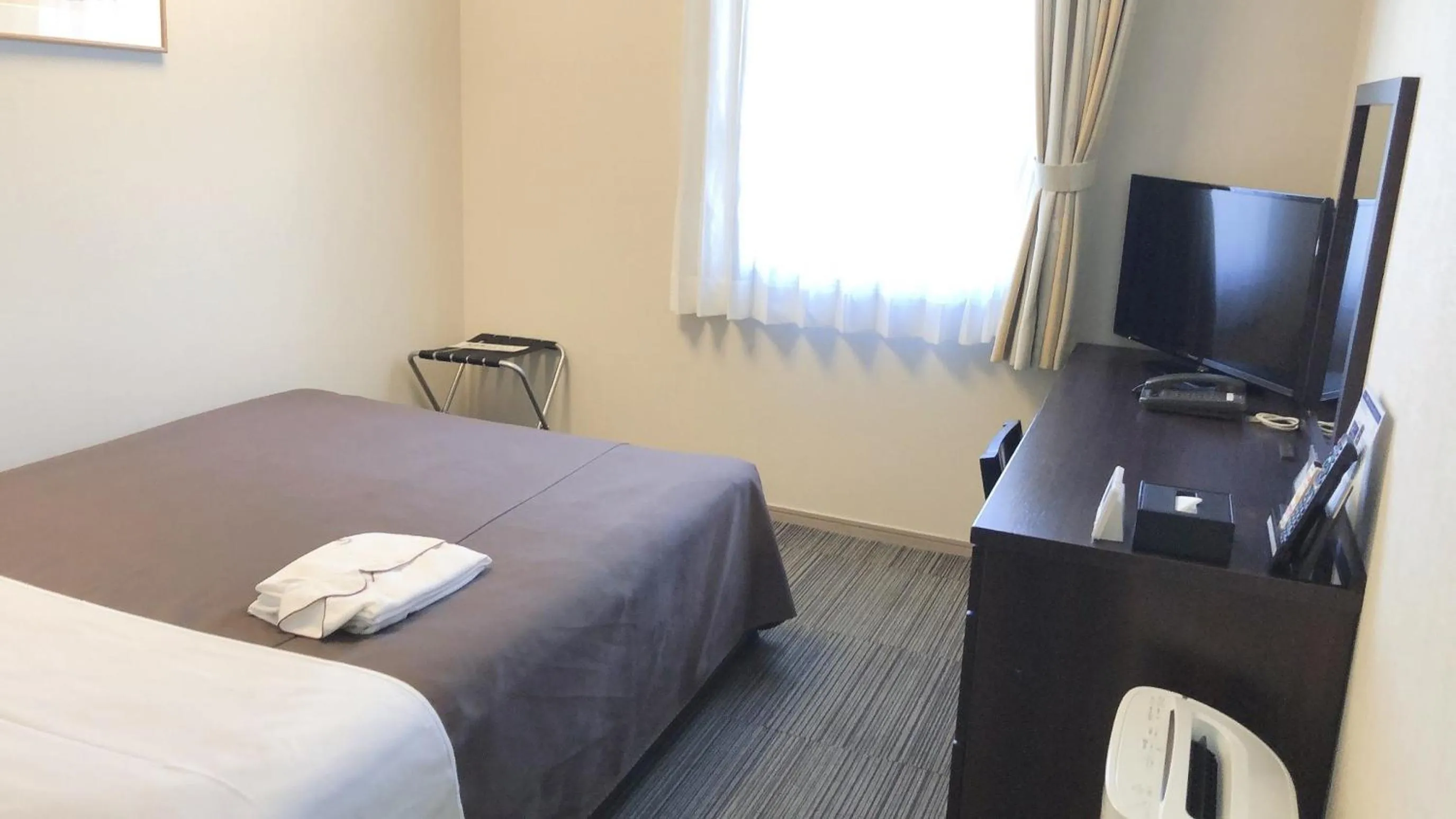Bed in HOTEL BRIGHT INN MORIOKA