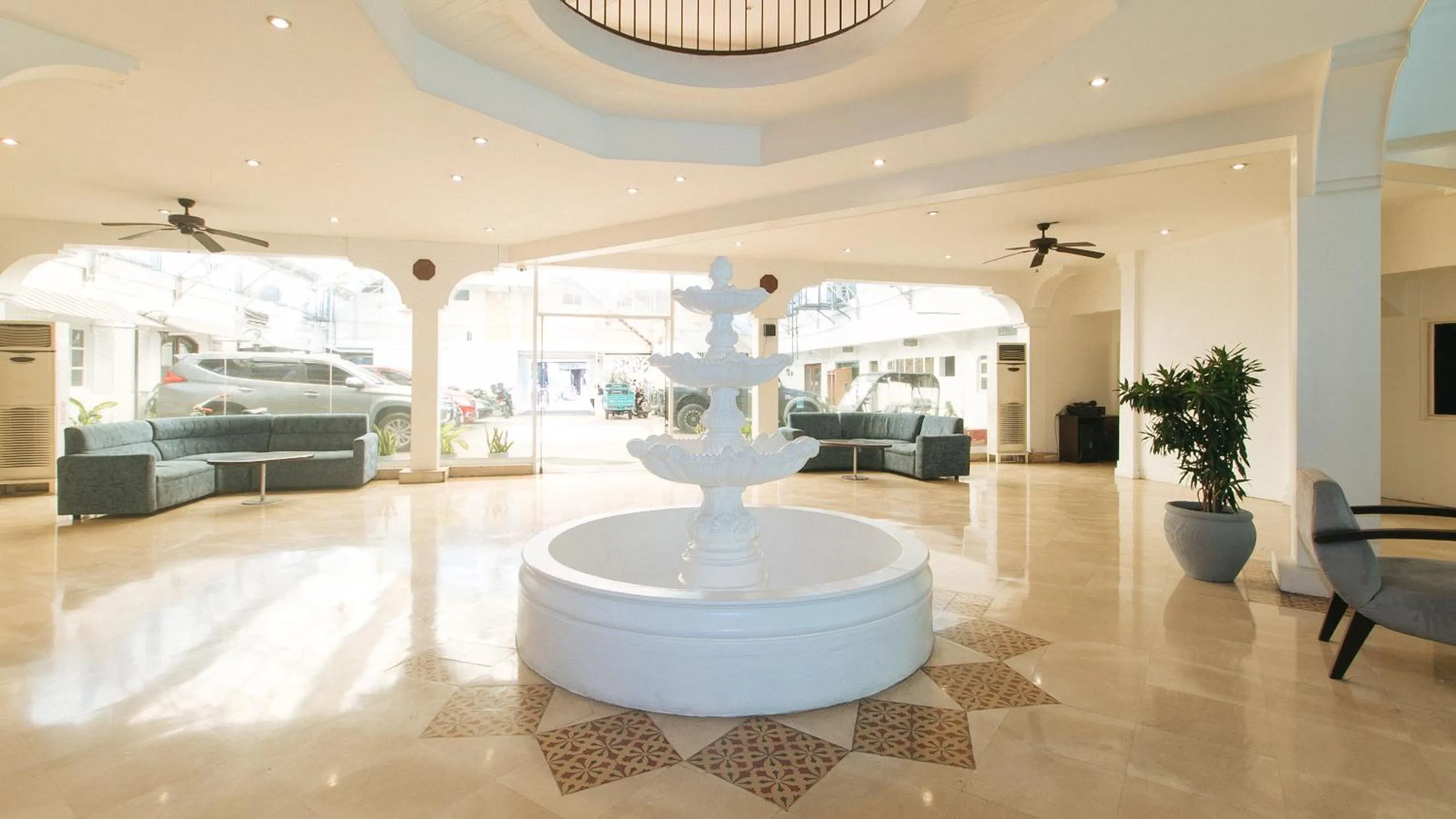 Seating area in Garden Plaza Hotel Manila