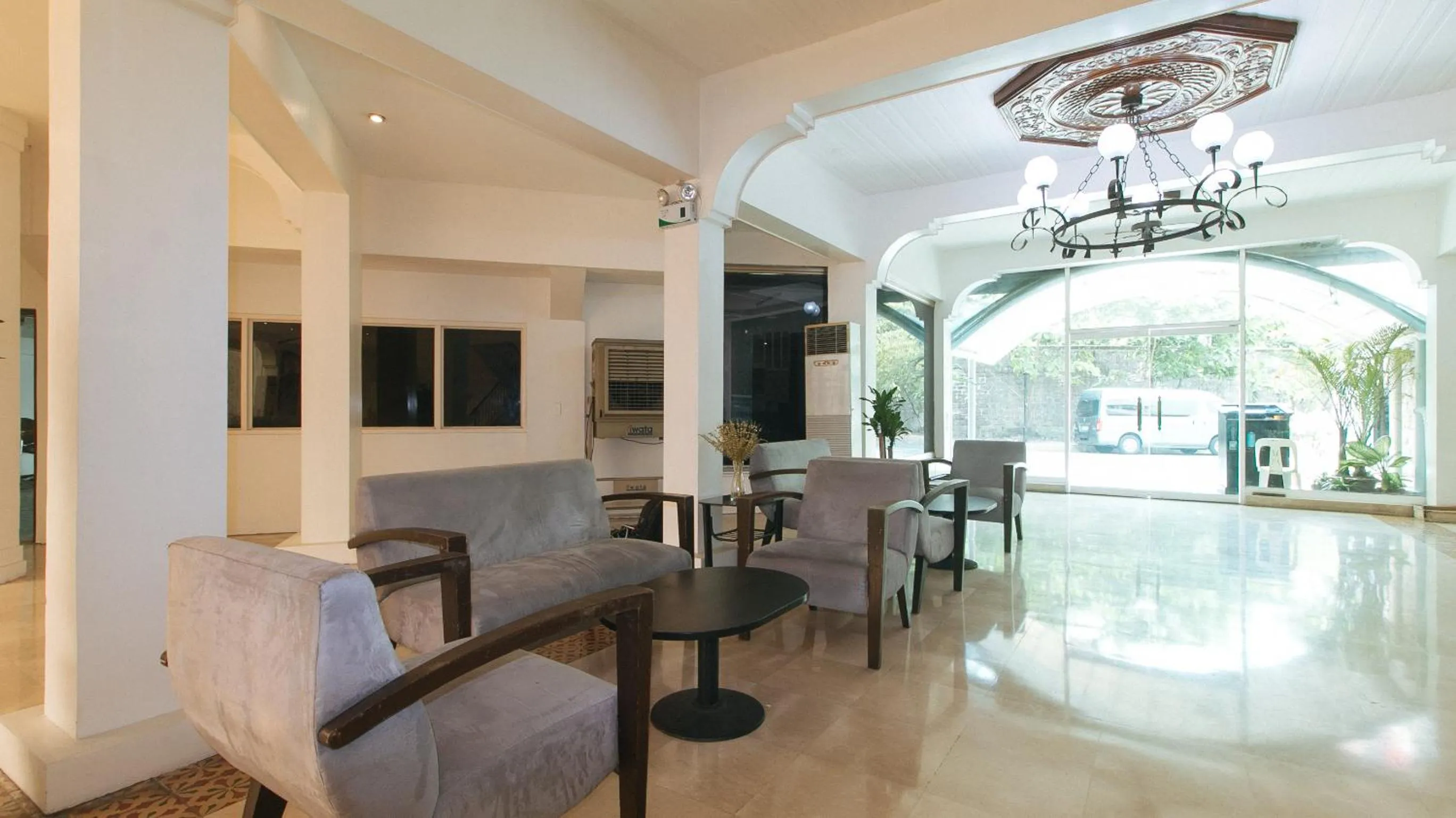 Seating area in Garden Plaza Hotel Manila