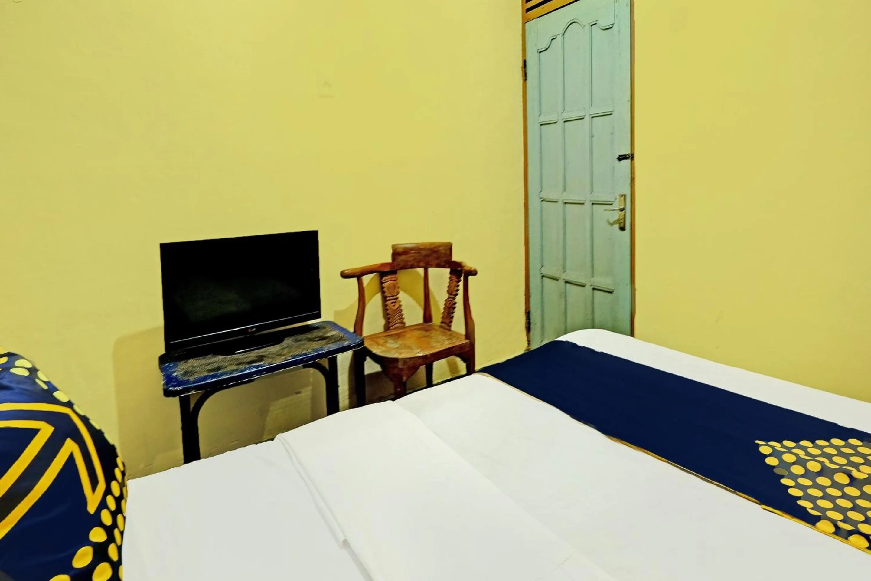 Bedroom in SPOT ON 92414 Hotel Pereng Sari