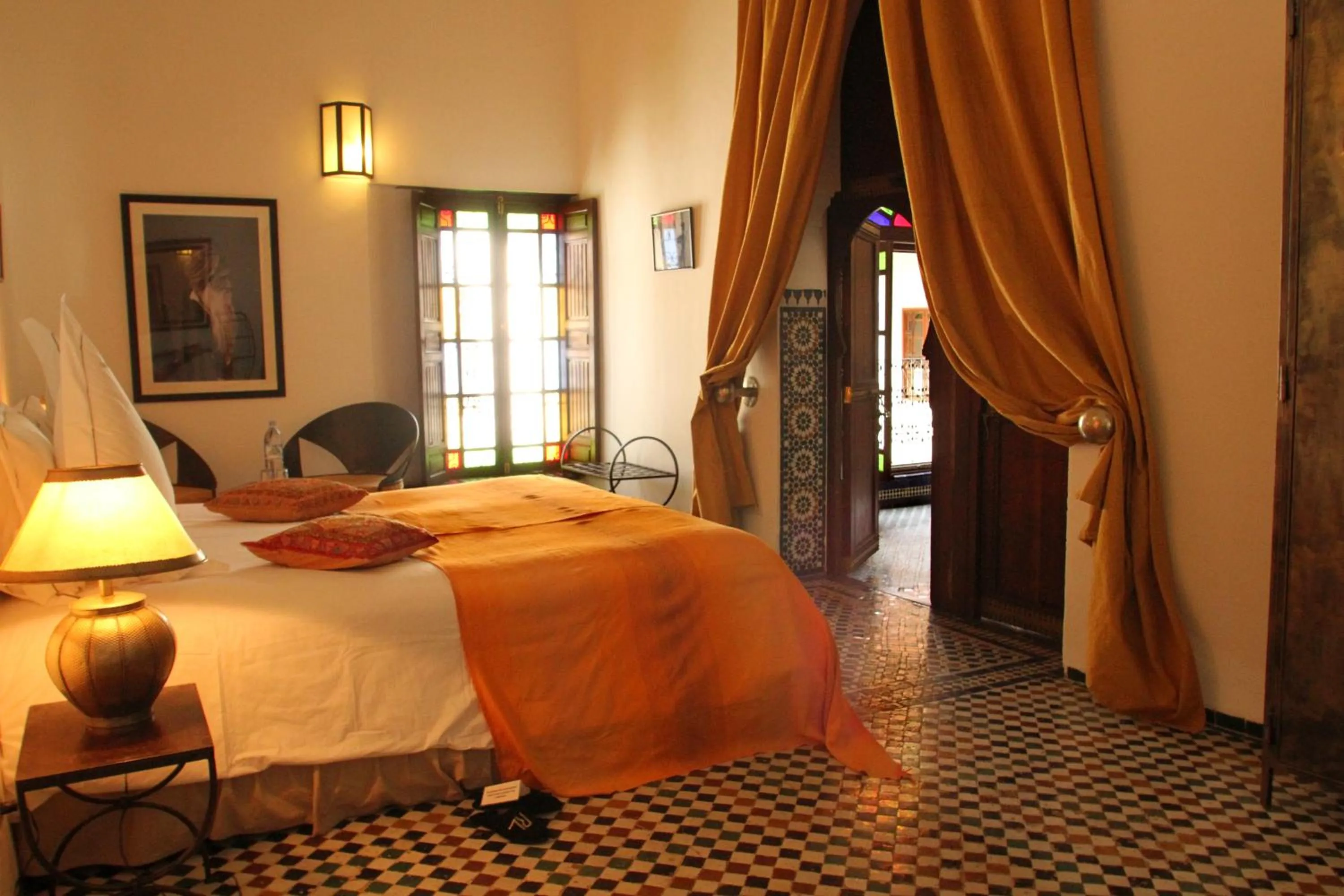 Photo of the whole room, Bed in Riad Laaroussa