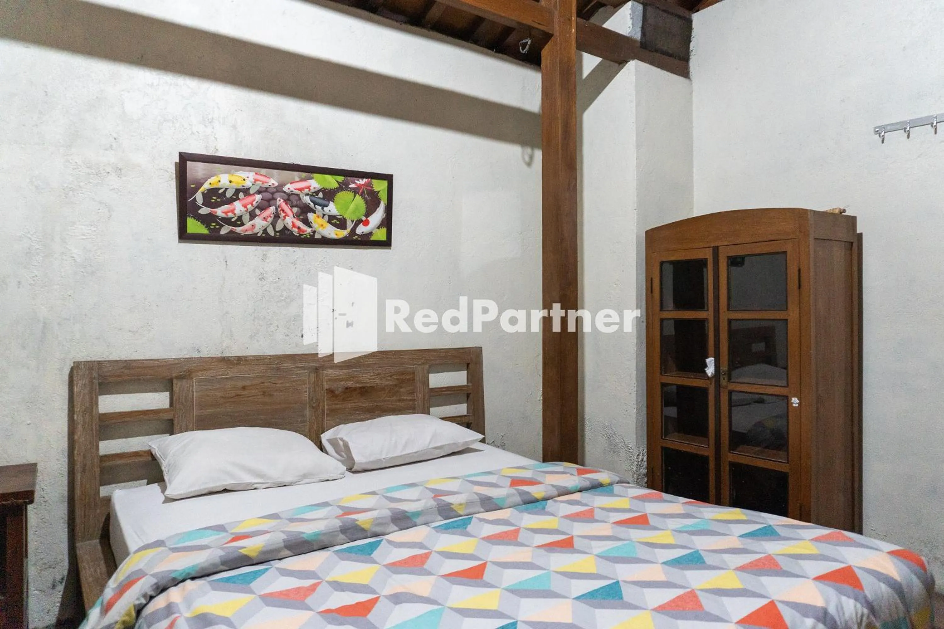 Bedroom, Bed in Javenir Hotel Tawangmangu Mitra RedDoorz