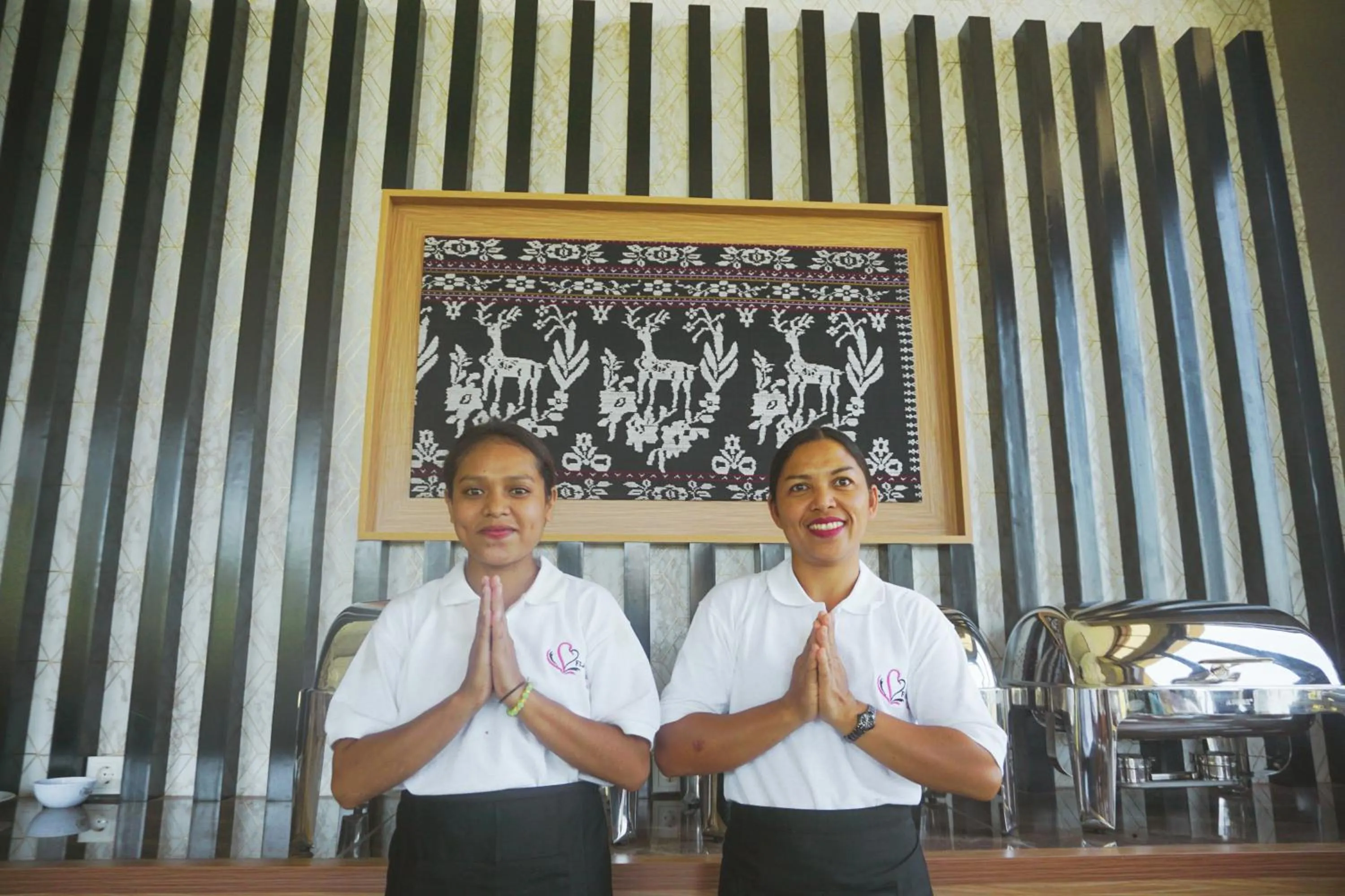 Staff in Flamingo Bajo Waecicu