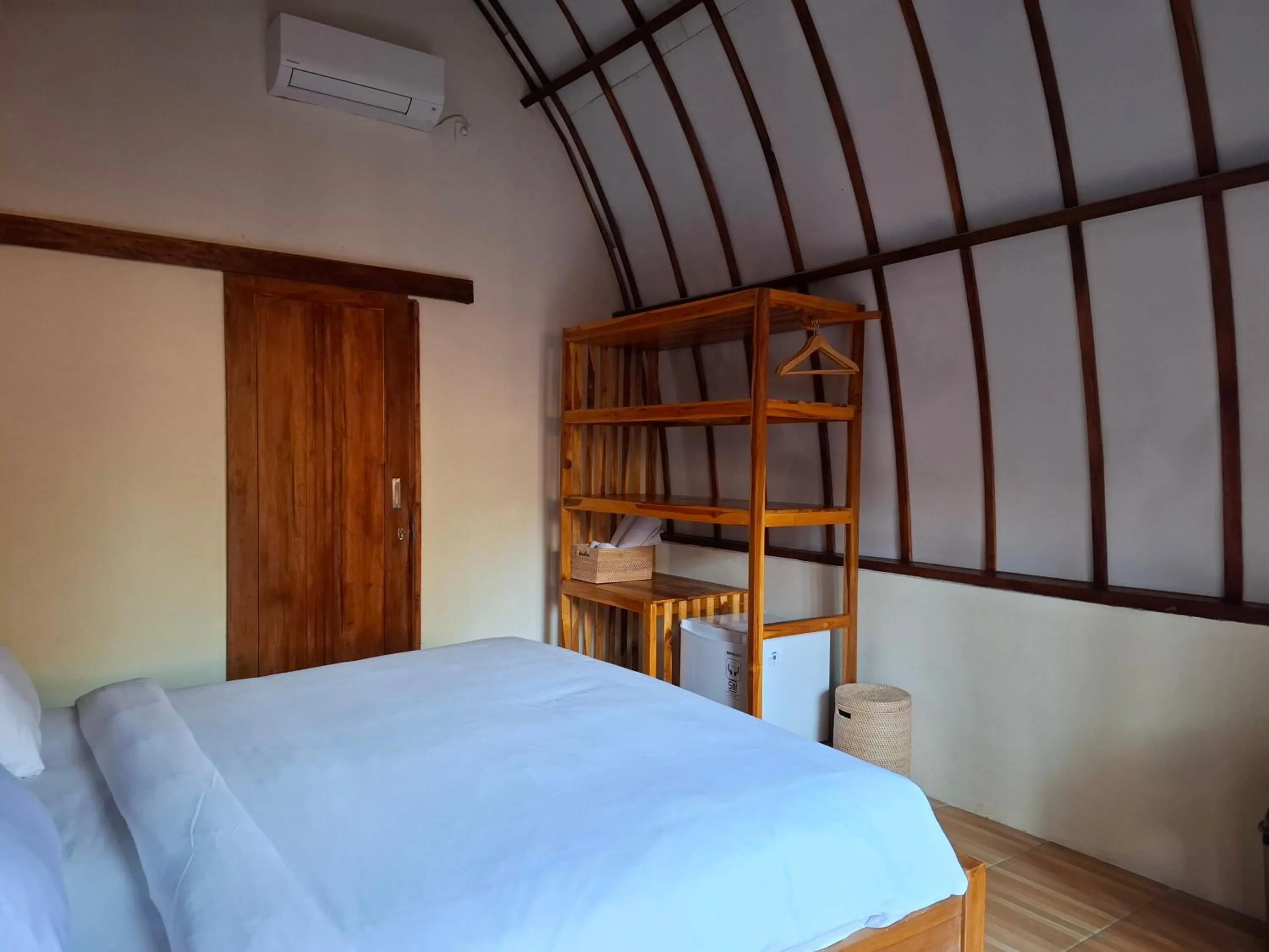 Bed in RaCottage Mandalika