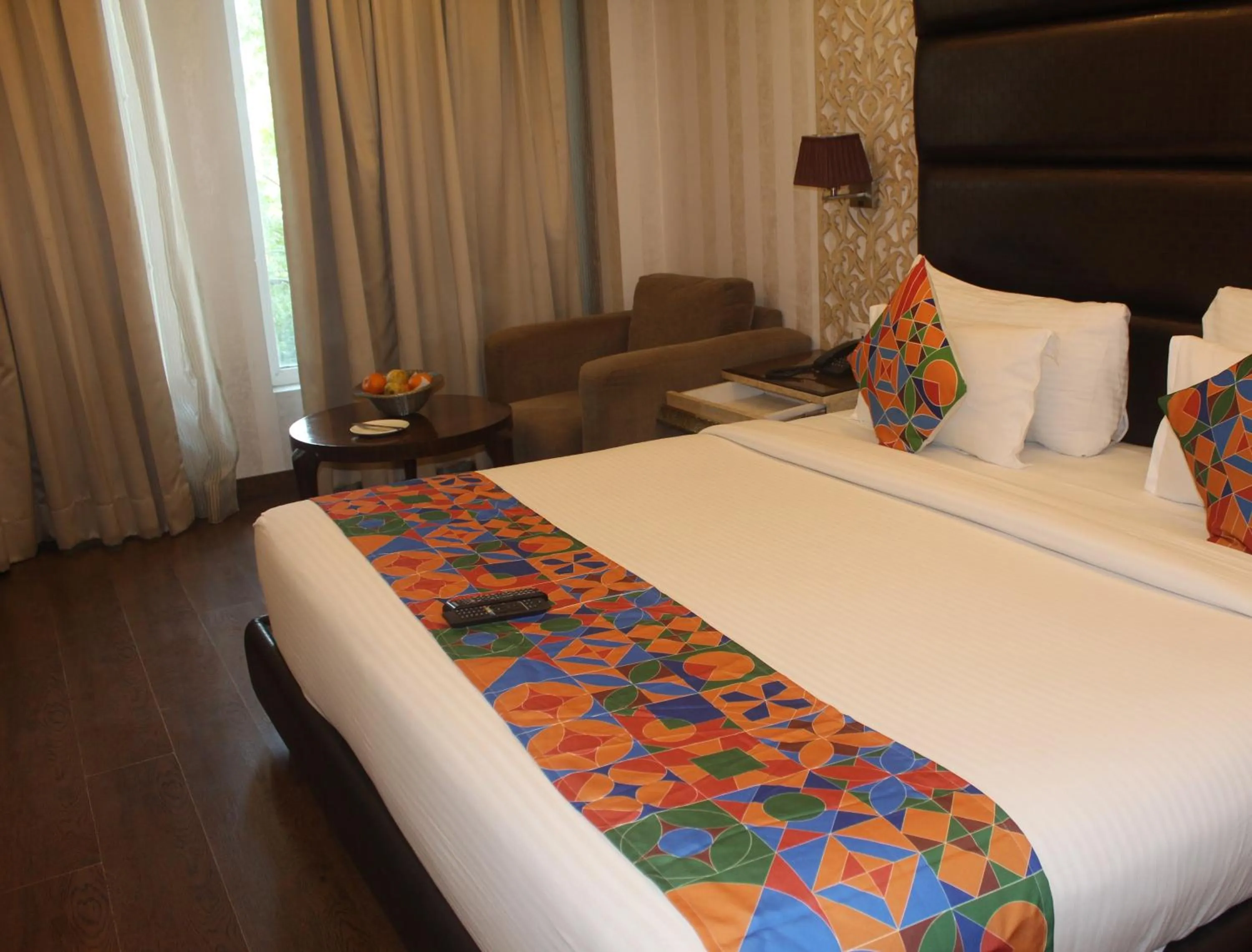 Bed in THE J K Hotel C R Park