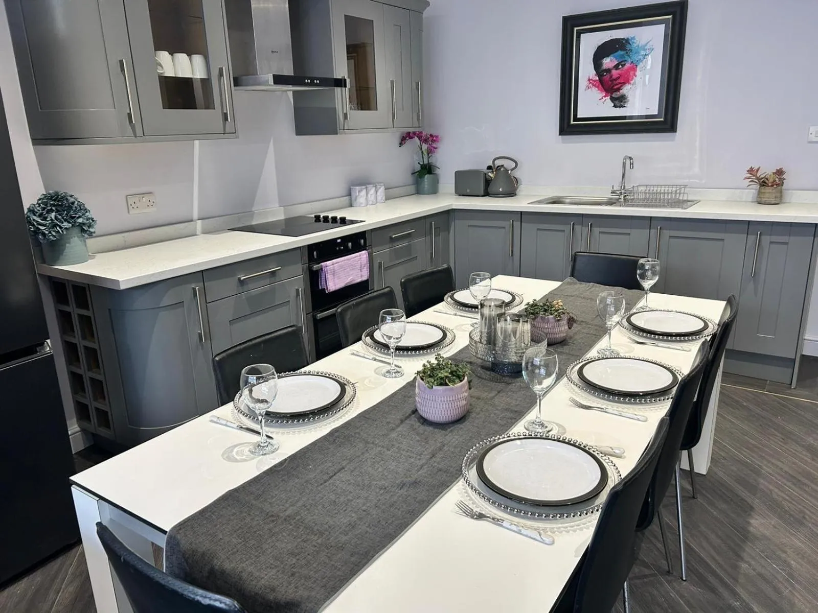 Kitchen or kitchenette in Sugar Hill Suite by Sasco Apartments